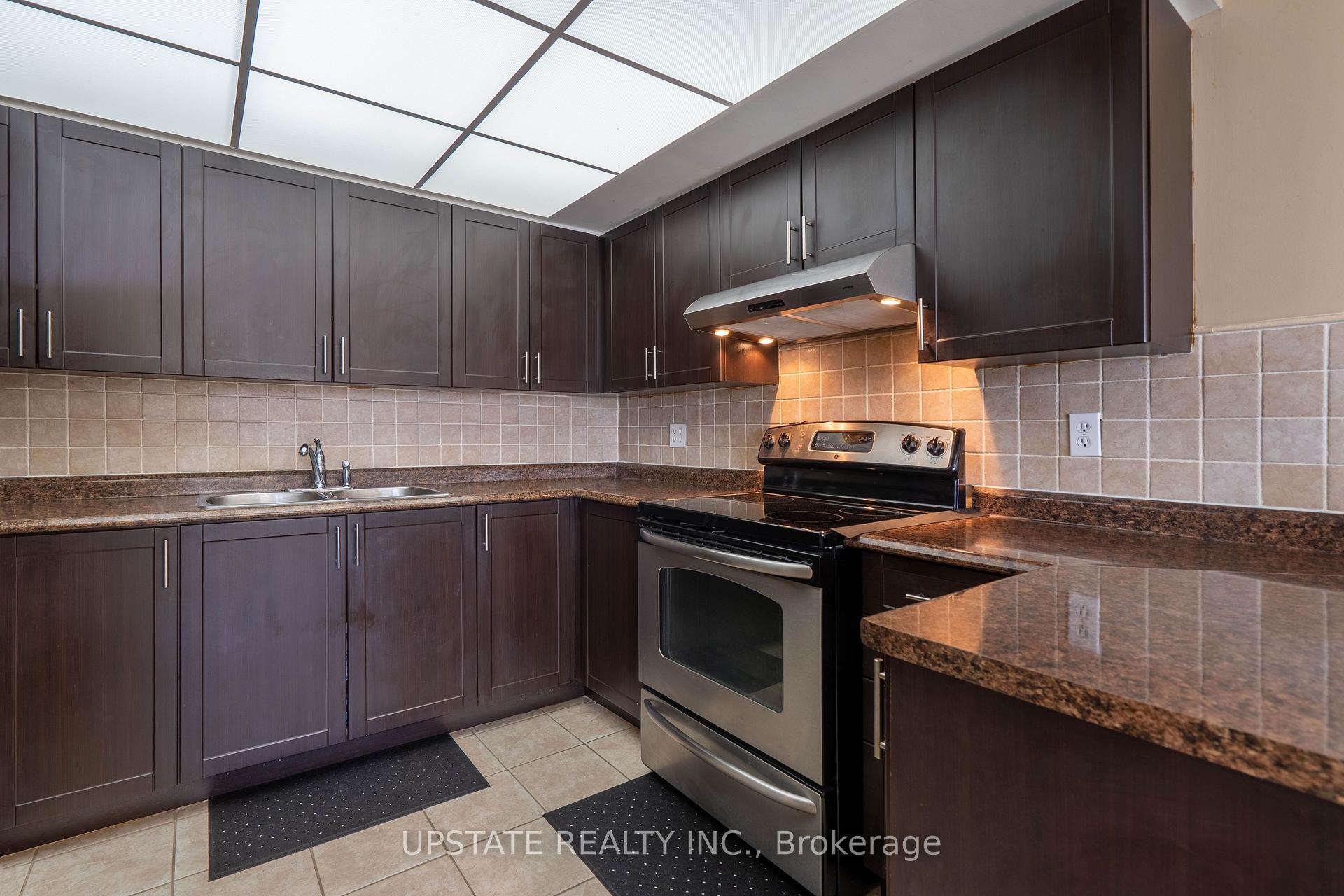 Photo 10 of Unit 306, 310 Mill Street S, Brampton, Brampton South — HOMEH