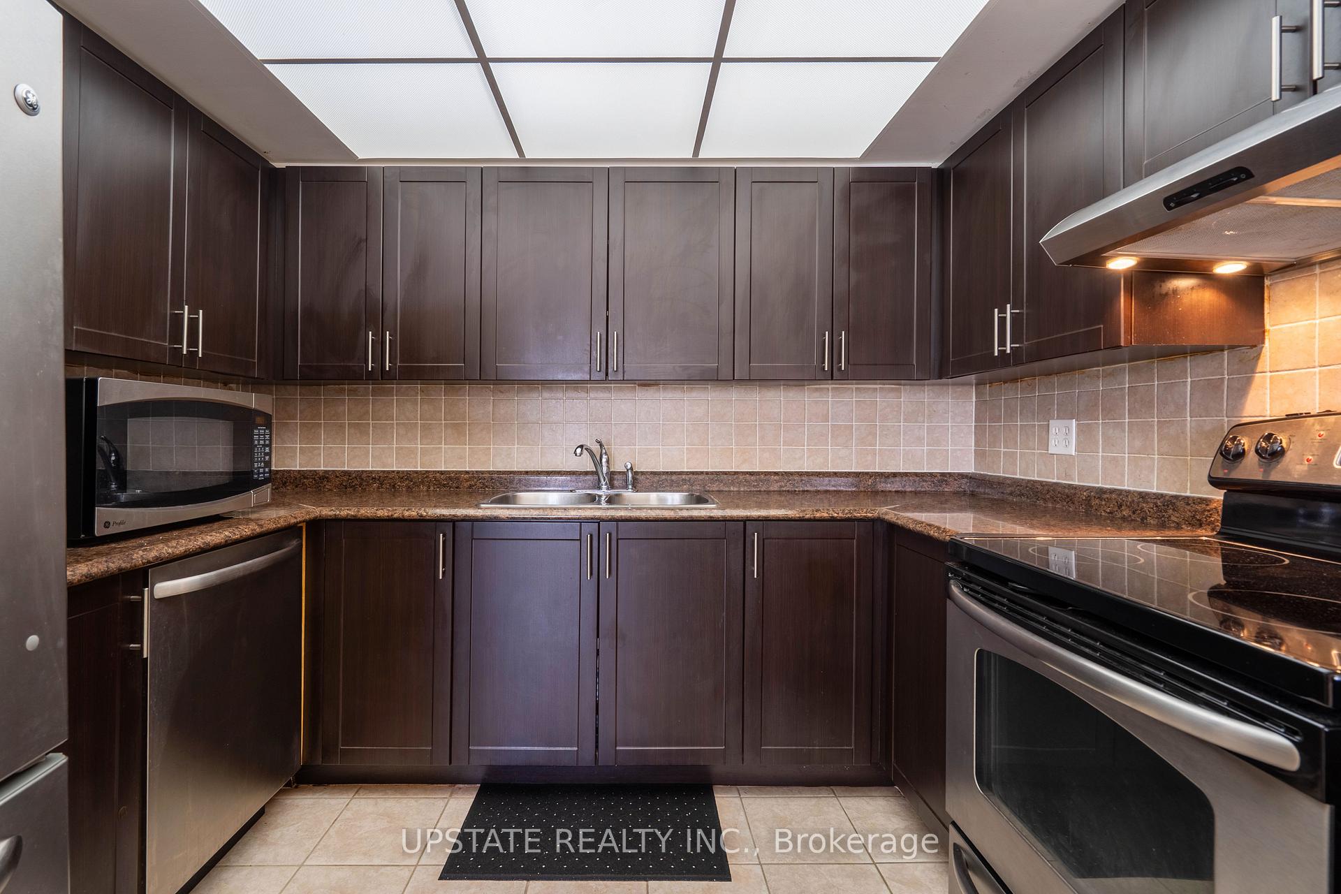 Photo 11 of Unit 306, 310 Mill Street S, Brampton, Brampton South — HOMEH