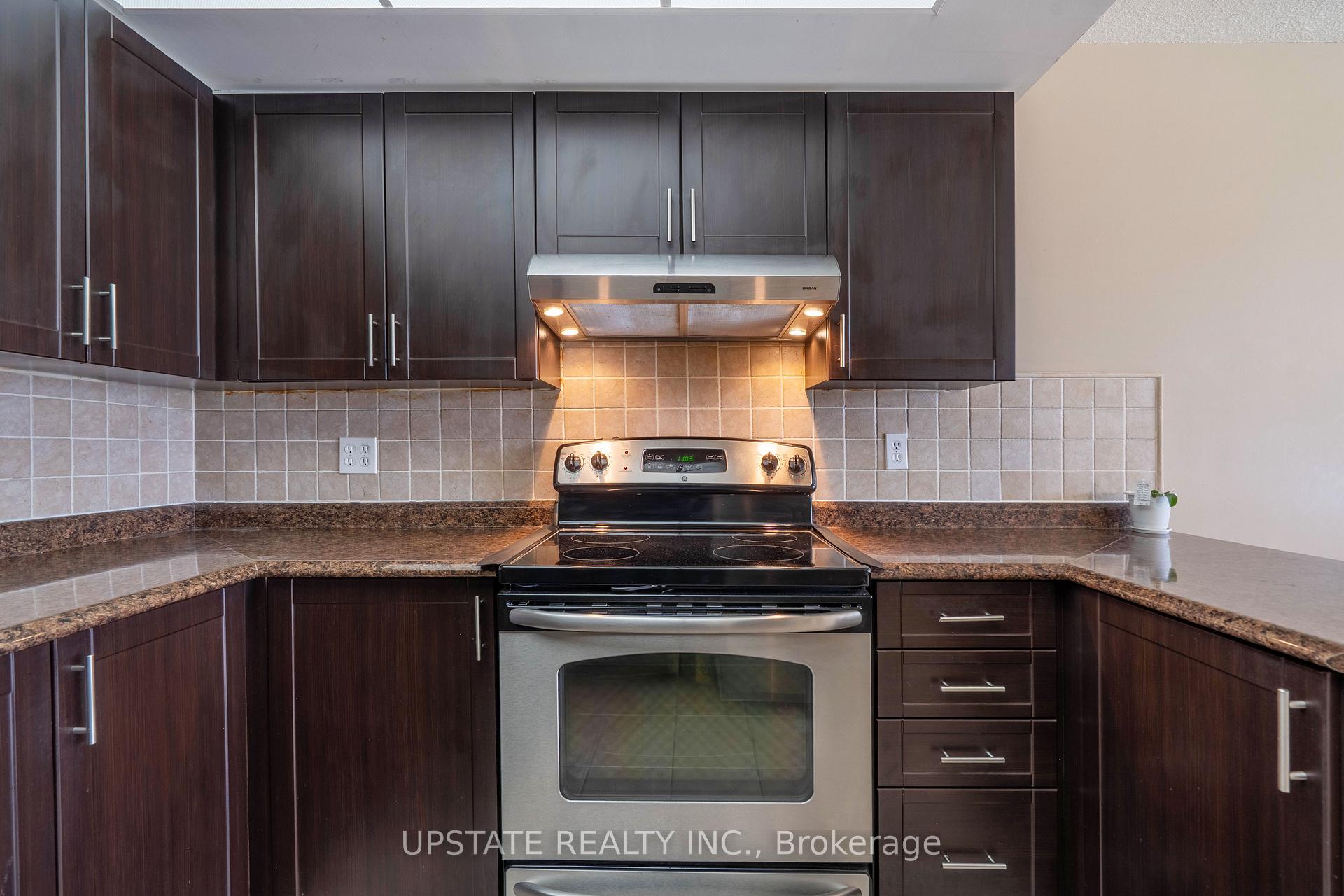 Photo 12 of Unit 306, 310 Mill Street S, Brampton, Brampton South — HOMEH