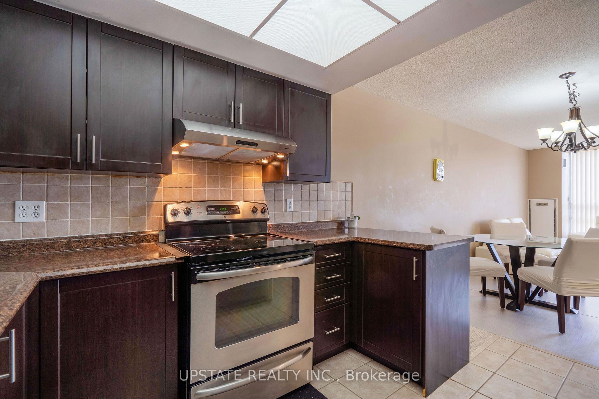 Photo 13 of Unit 306, 310 Mill Street S, Brampton, Brampton South — HOMEH
