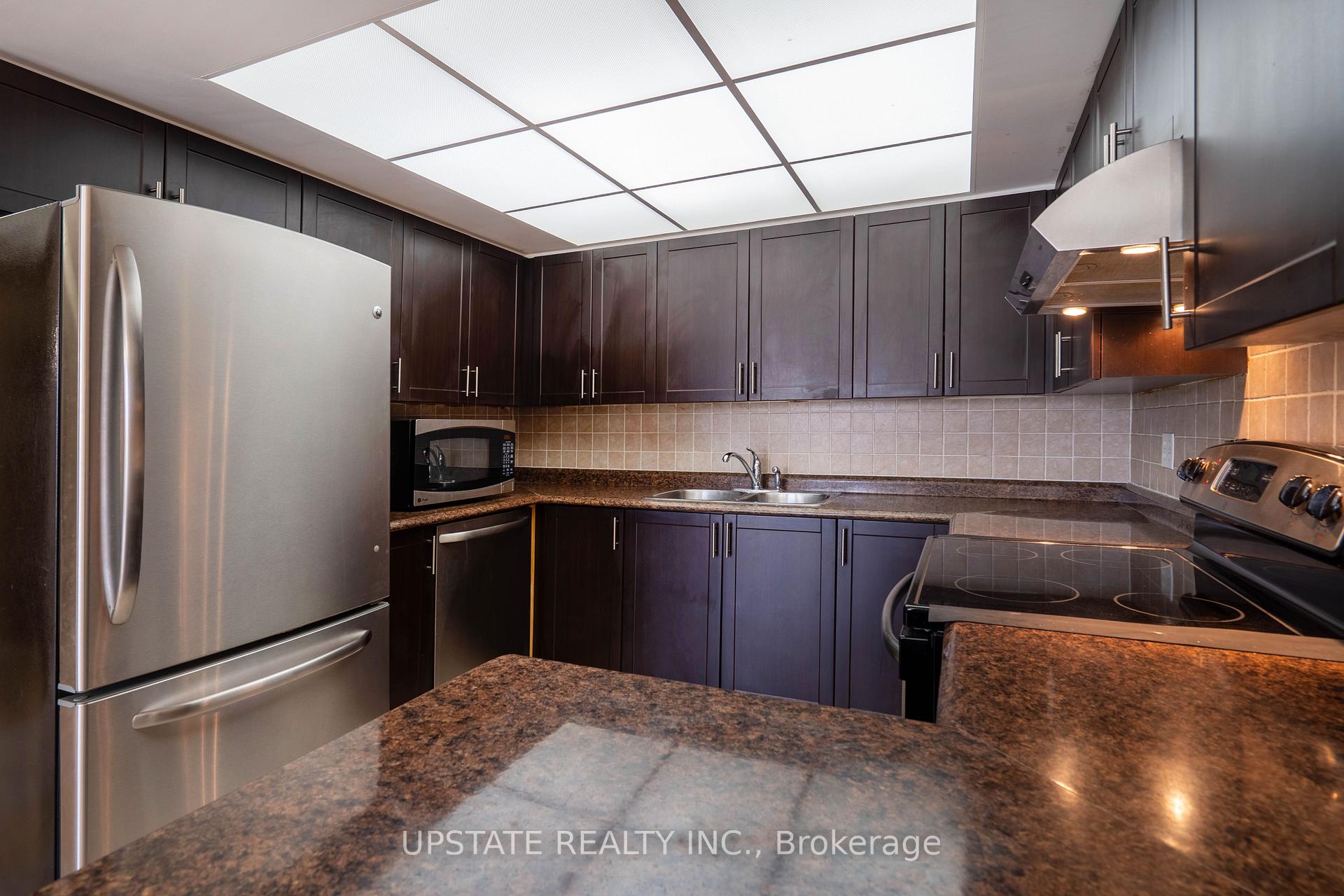 Photo 14 of Unit 306, 310 Mill Street S, Brampton, Brampton South — HOMEH