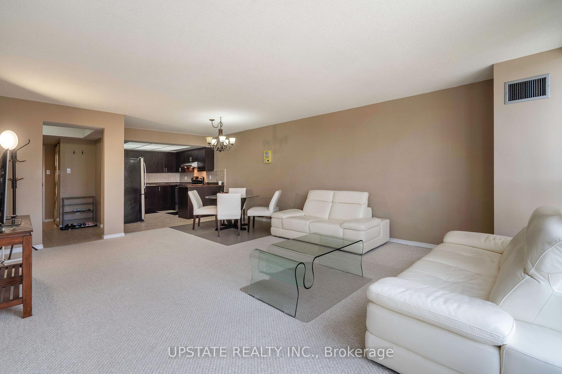 Photo 16 of Unit 306, 310 Mill Street S, Brampton, Brampton South — HOMEH