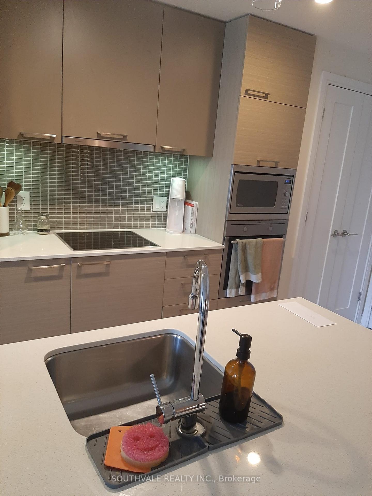 Photo 2 of Unit #701, 55 Front Street E, Toronto, Waterfront Communities — HOMEH