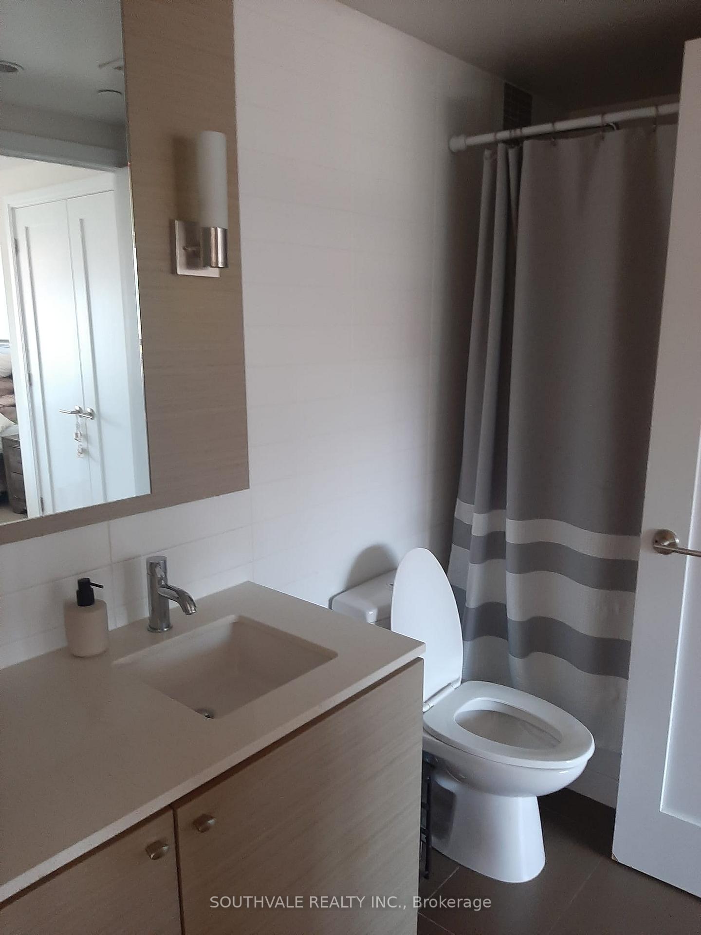 Photo 9 of Unit #701, 55 Front Street E, Toronto, Waterfront Communities — HOMEH