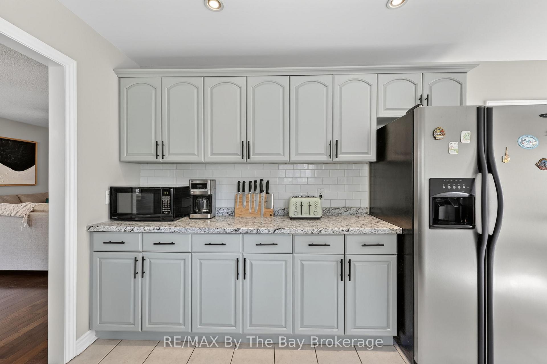 Photo 5 of 326 Golf Course Road, Wasaga Beach — HOMEH