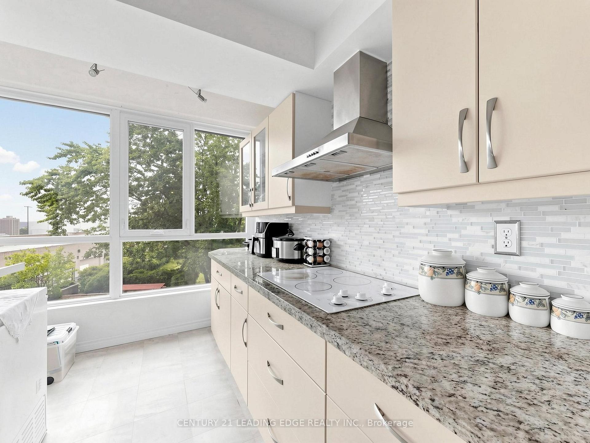 Photo 2 of Unit 204, 3231 Eglinton Avenue E, Scarborough, Scarborough Village — HOMEH