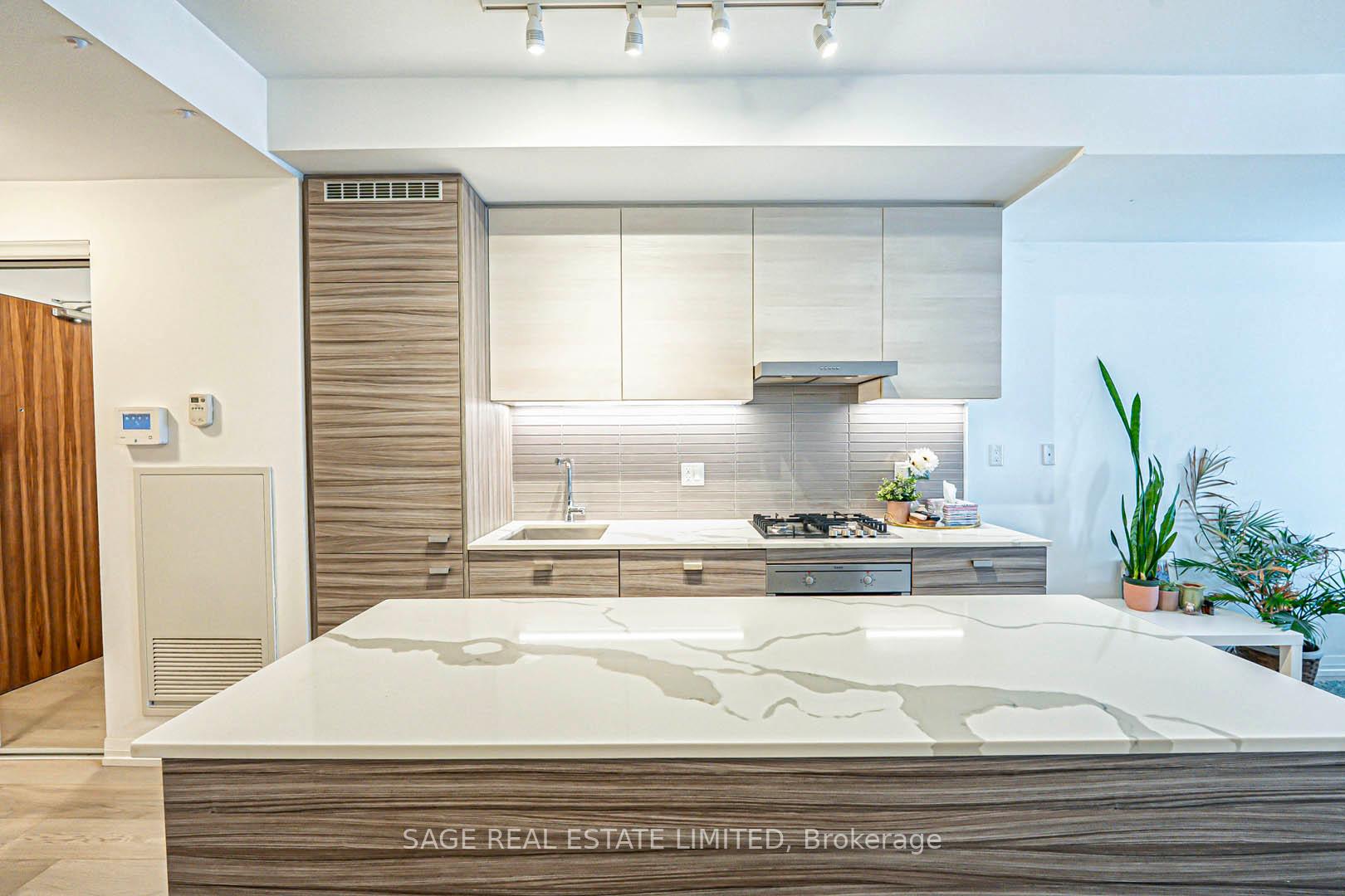 Photo 5 of Unit 406, 835 St Clair Avenue W, Toronto, Wychwood — HOMEH