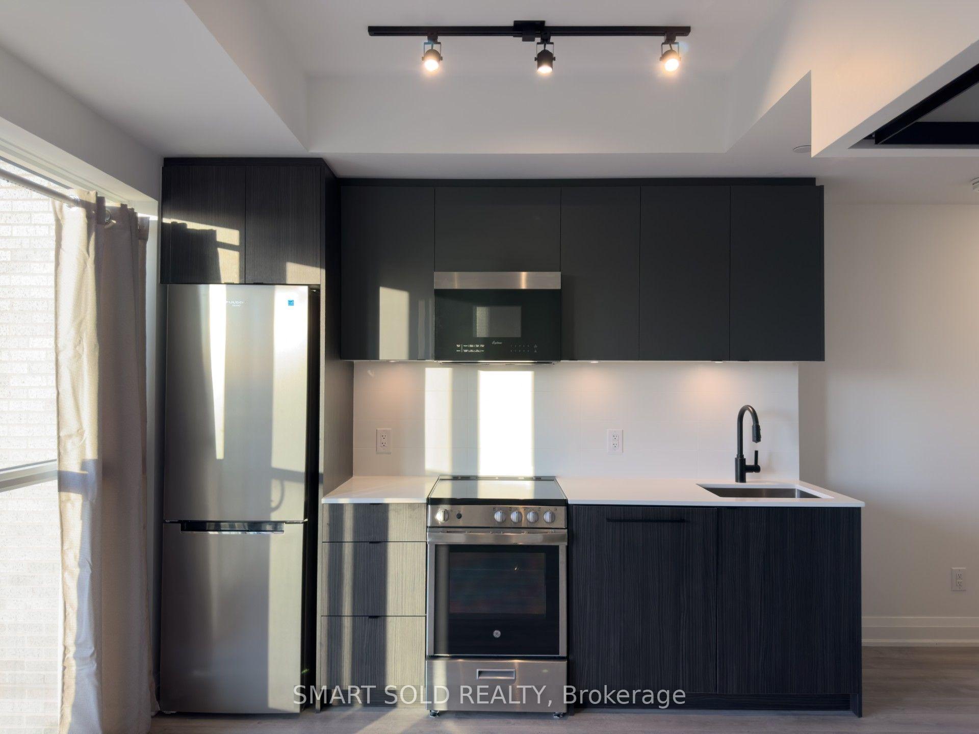 Photo 6 of Unit 704, 2369 Danforth Avenue, Toronto, East End-Danforth — HOMEH