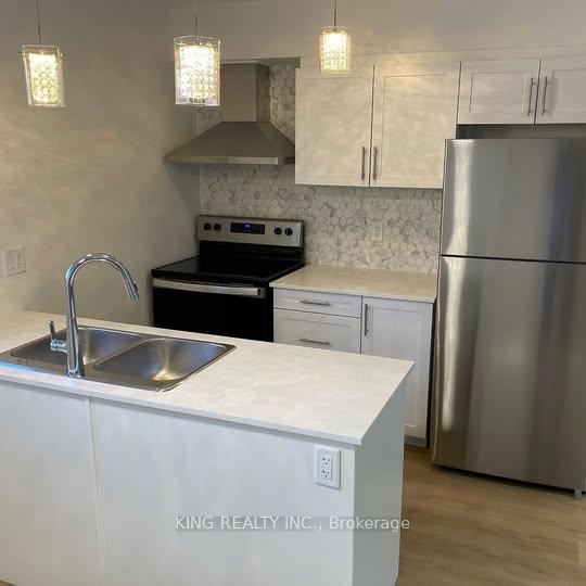 Photo 4 of Unit 101, 894 Adelaide Street N, London, East C — HOMEH
