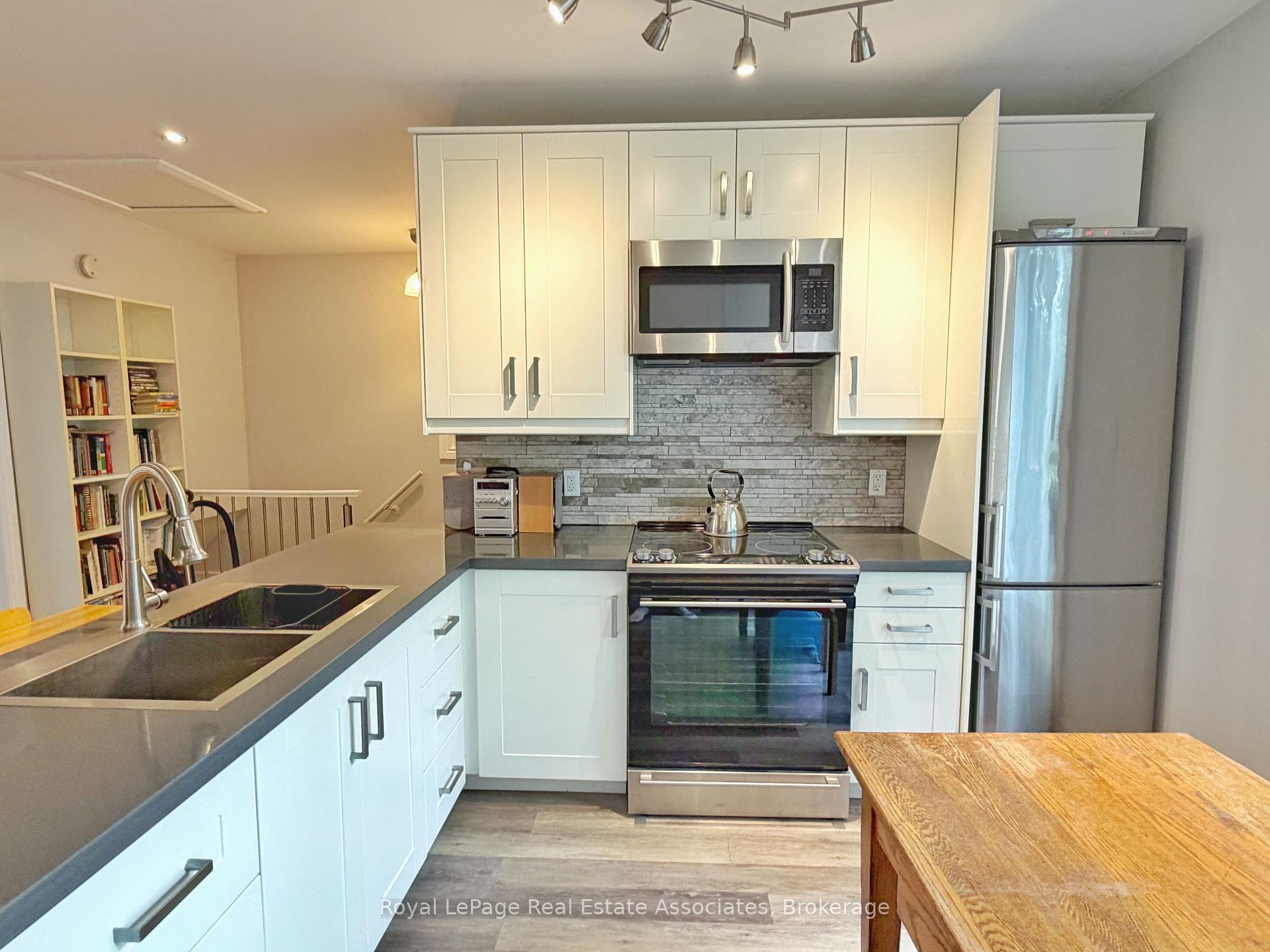 Photo 5 of 157 Glenmore Road, Toronto, Woodbine Corridor — HOMEH