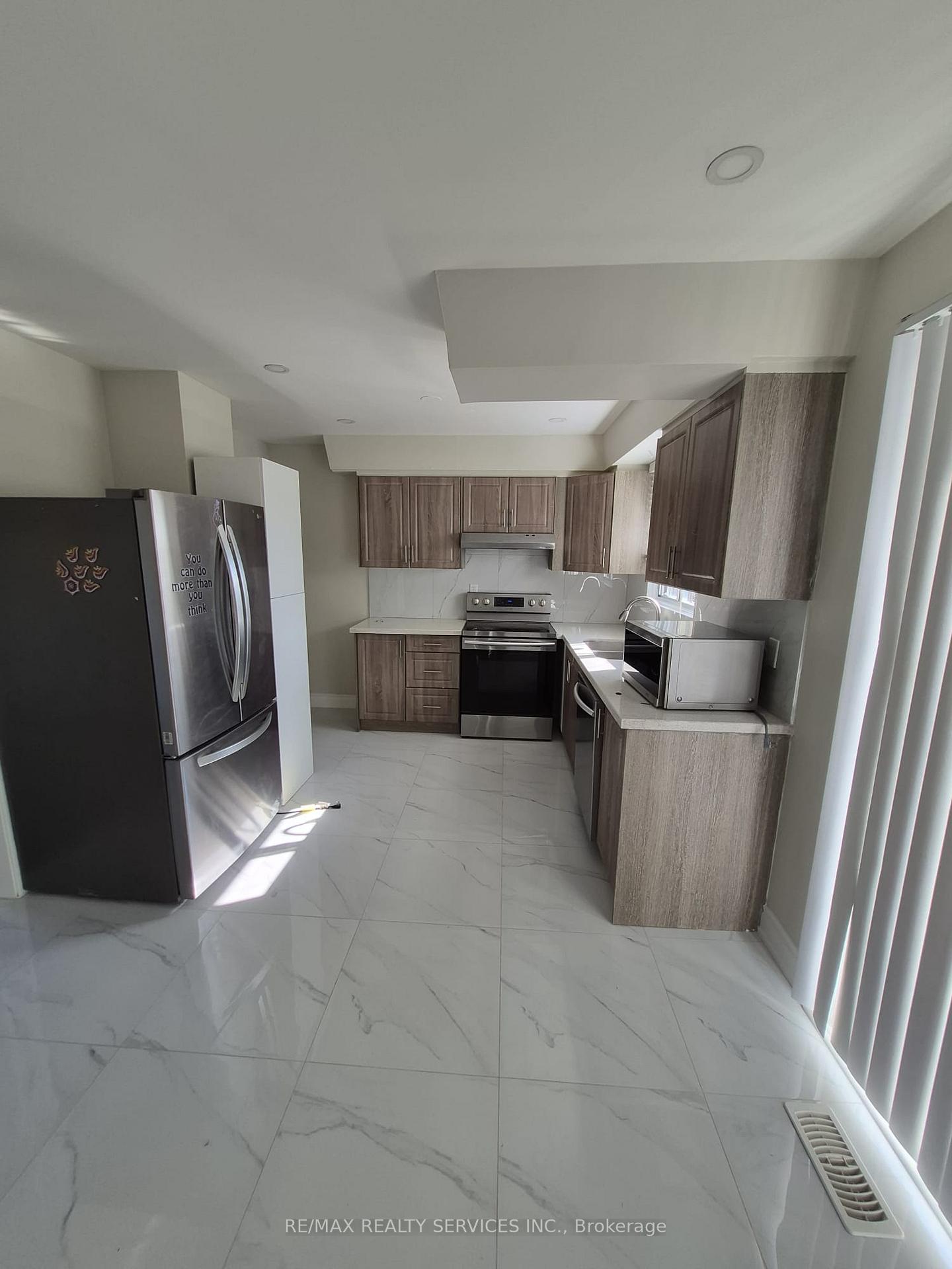 Photo 4 of 35 Jersey Avenue, Brampton, Brampton East — HOMEH