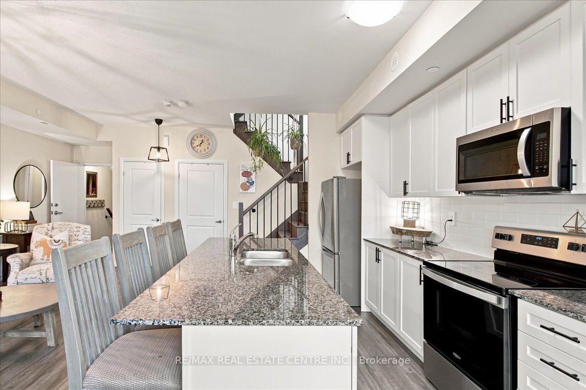 Photo 6 of Unit 103, 1597 Rose Way, Milton, Cobban — HOMEH