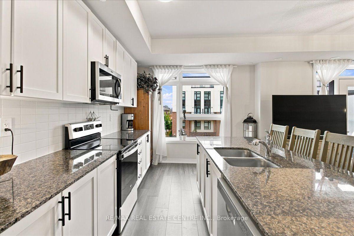 Photo 10 of Unit 103, 1597 Rose Way, Milton, Cobban — HOMEH