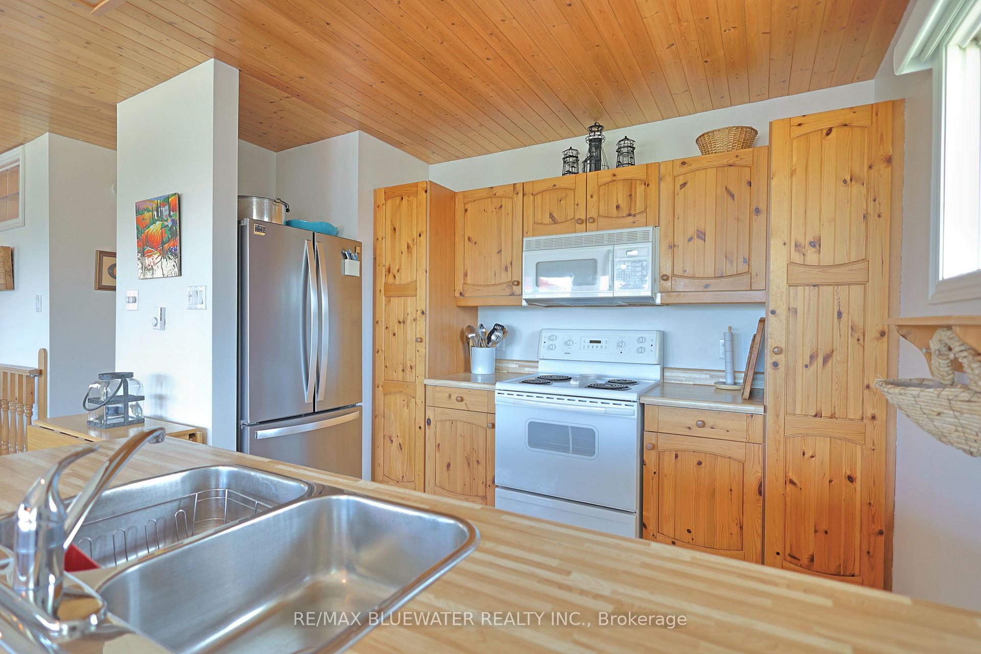 Photo 5 of 74156 Bluehaven Beach Drive, Bluewater, Stanley — HOMEH