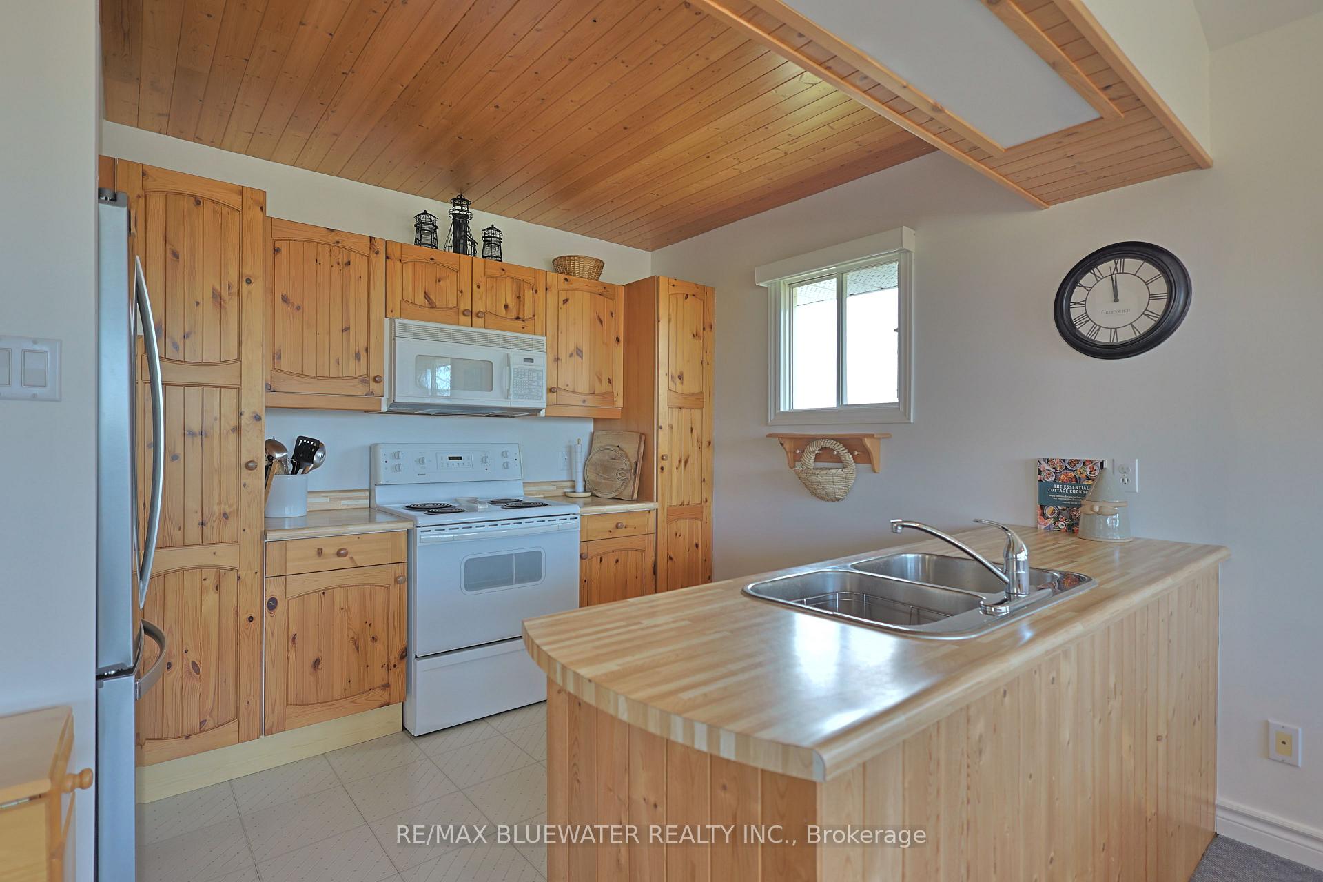 Photo 22 of 74156 Bluehaven Beach Drive, Bluewater, Stanley — HOMEH