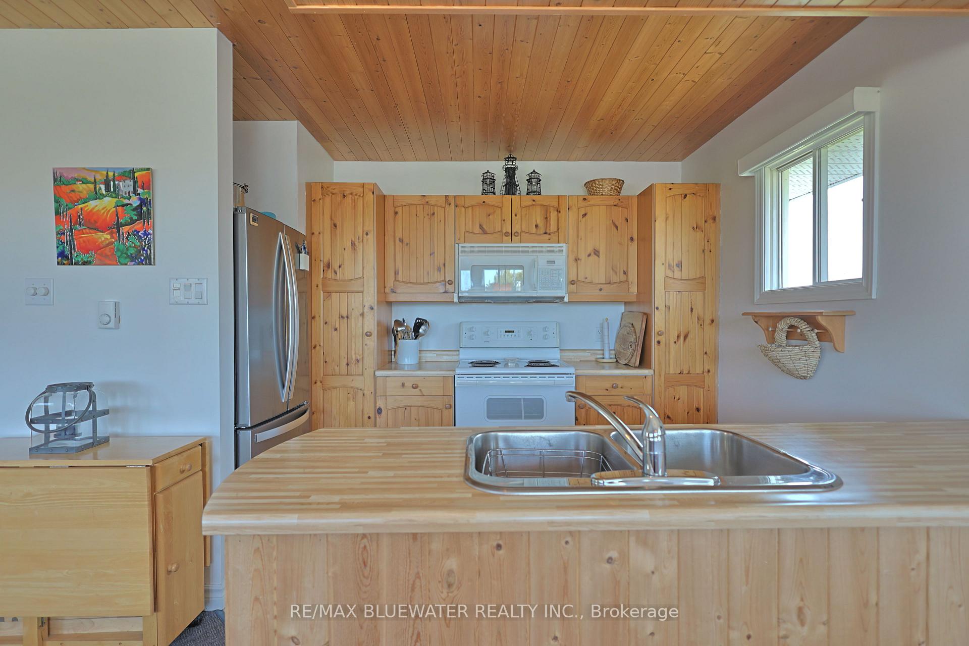 Photo 23 of 74156 Bluehaven Beach Drive, Bluewater, Stanley — HOMEH