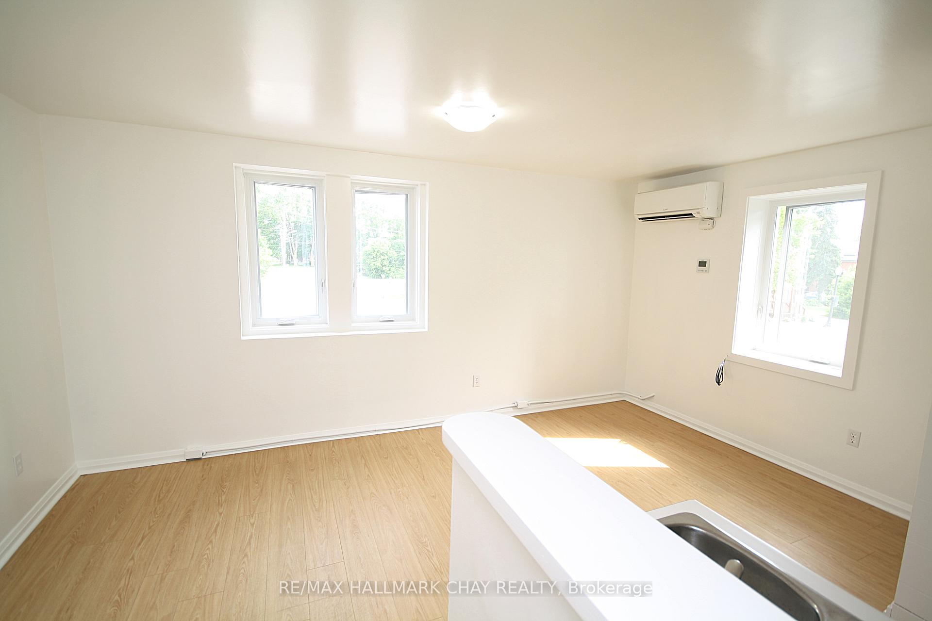 Photo 1 of Unit 1, 58 Queen Street W, Springwater, Elmvale — HOMEH