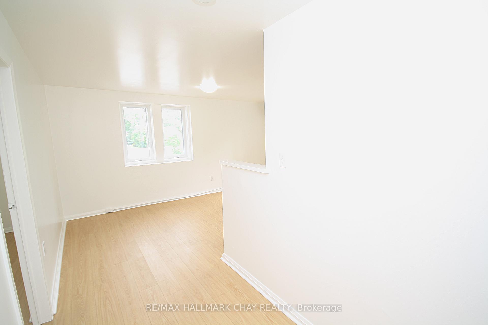 Photo 2 of Unit 1, 58 Queen Street W, Springwater, Elmvale — HOMEH