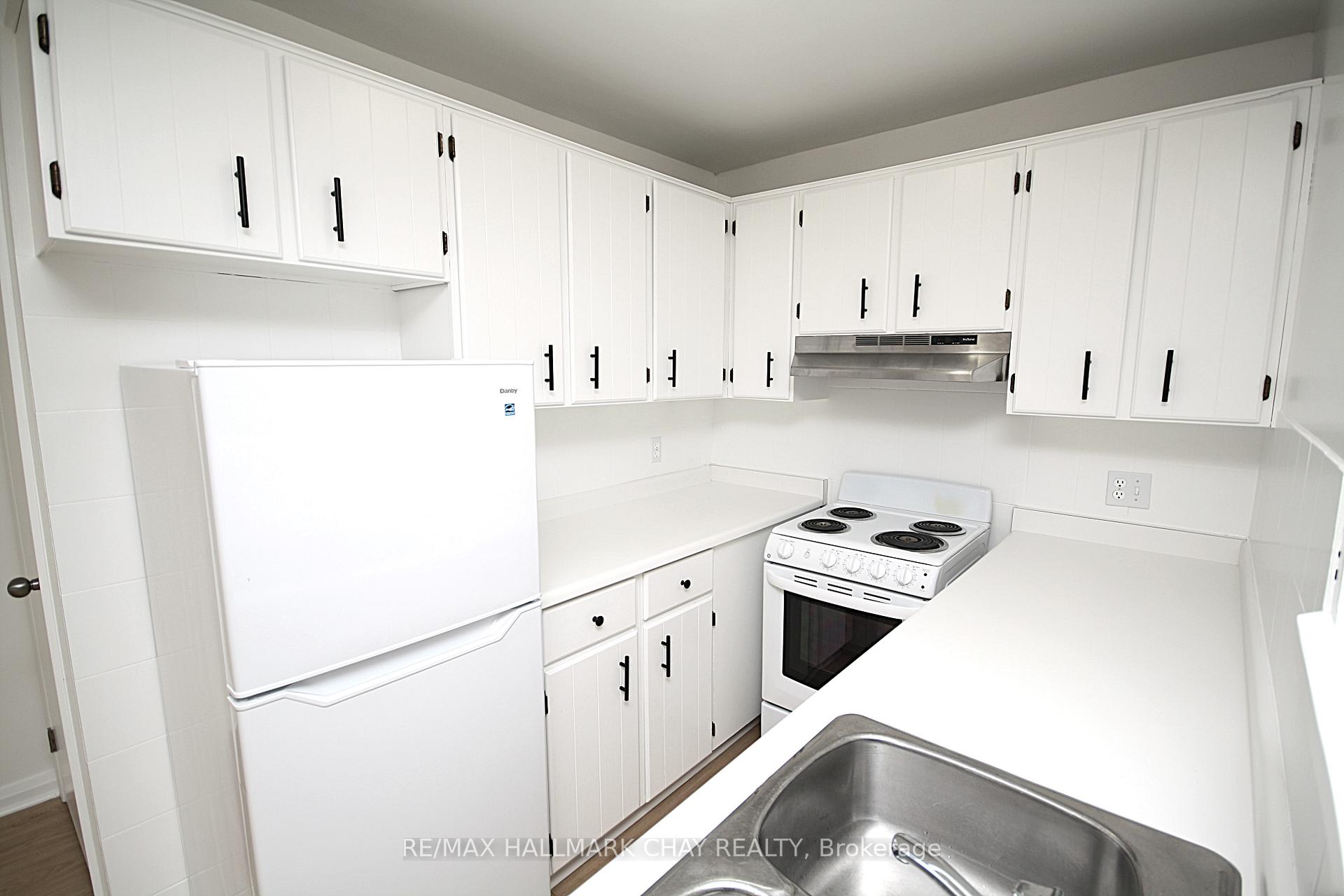 Photo 3 of Unit 1, 58 Queen Street W, Springwater, Elmvale — HOMEH