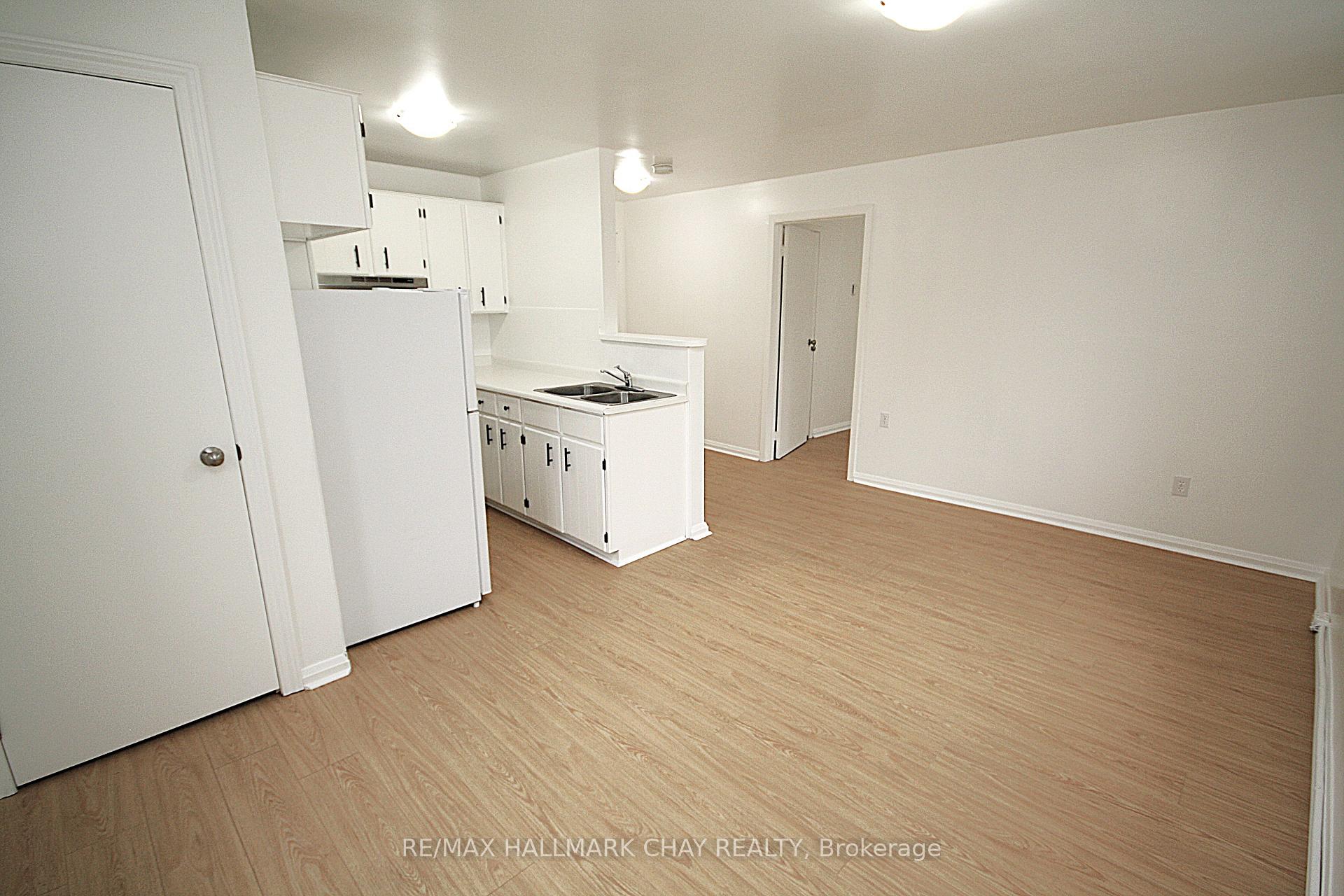 Photo 4 of Unit 1, 58 Queen Street W, Springwater, Elmvale — HOMEH