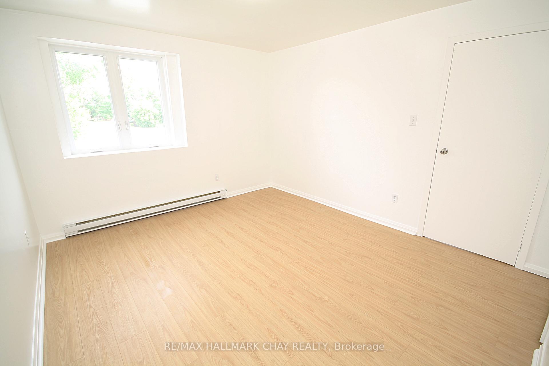 Photo 6 of Unit 1, 58 Queen Street W, Springwater, Elmvale — HOMEH
