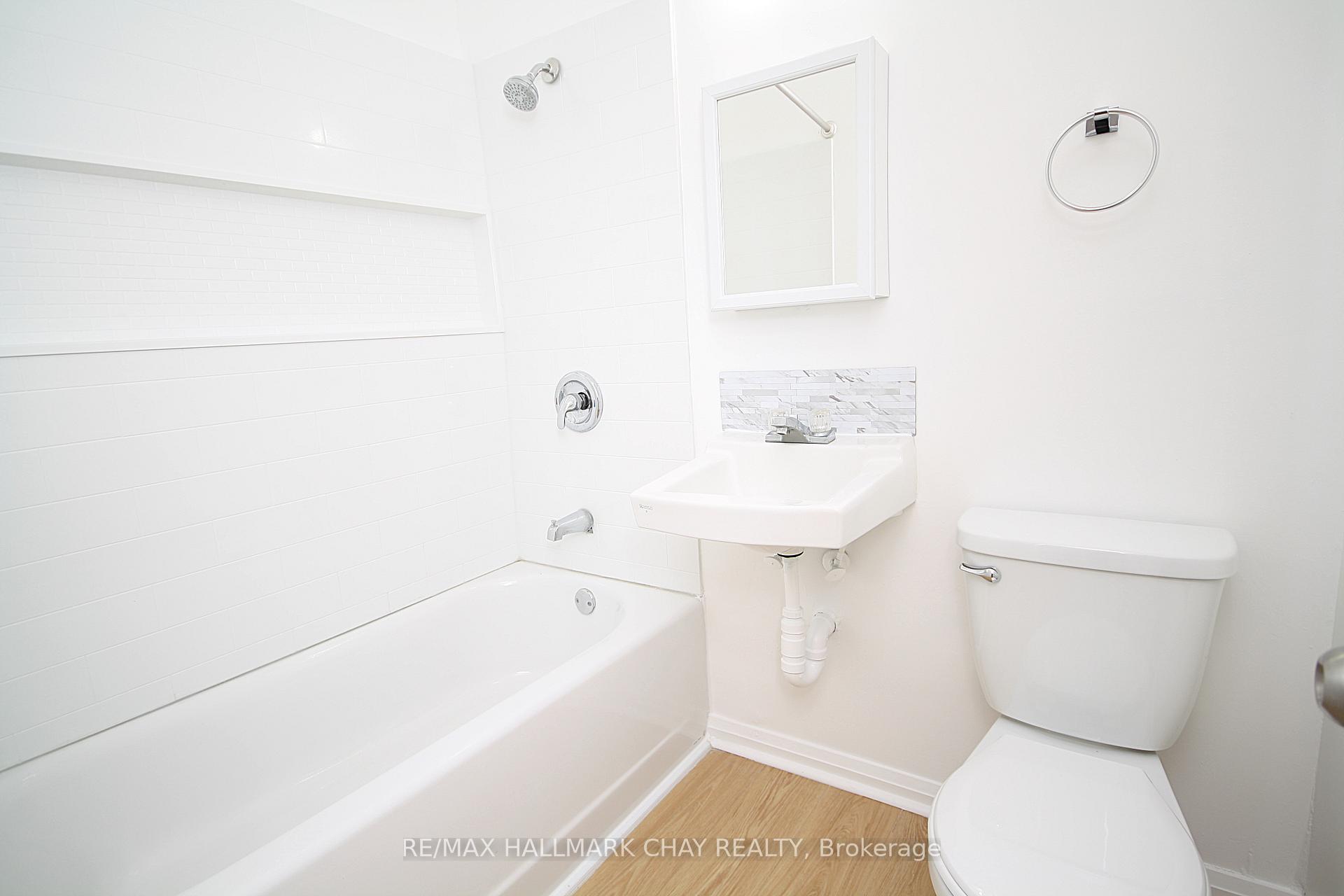 Photo 7 of Unit 1, 58 Queen Street W, Springwater, Elmvale — HOMEH