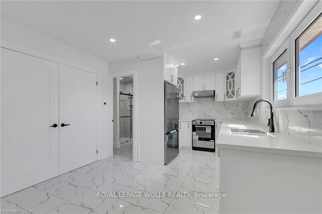 Photo 1 of Unit 2, 581 Lancaster Street W, Kitchener, Lexington/Lincoln Village — HOMEH
