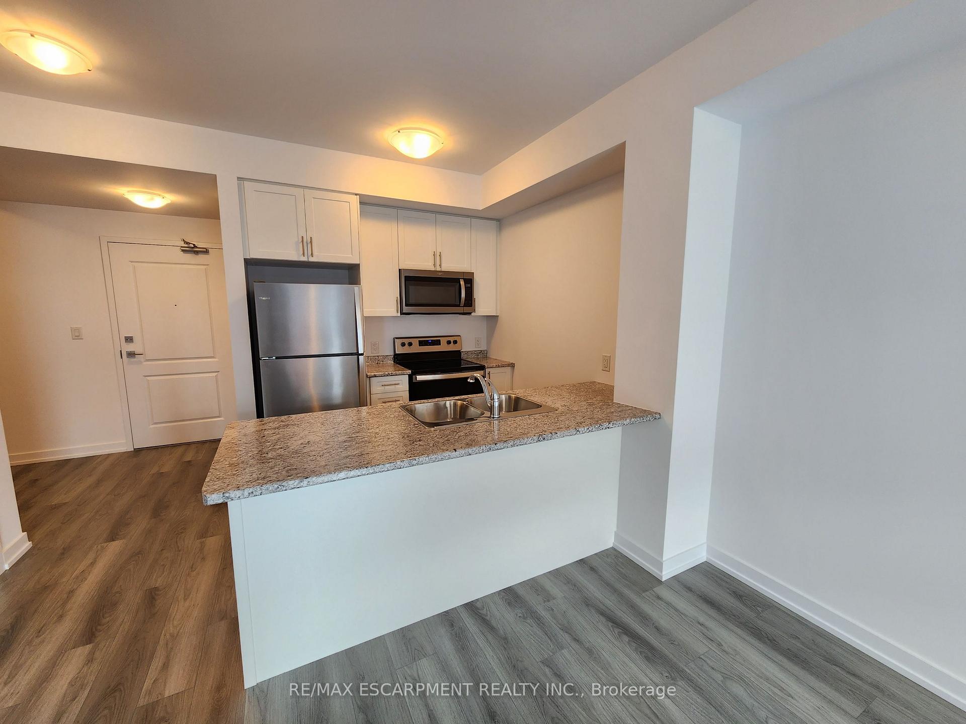Photo 3 of Unit 714, 460 Dundas Street E, Hamilton, Waterdown — HOMEH