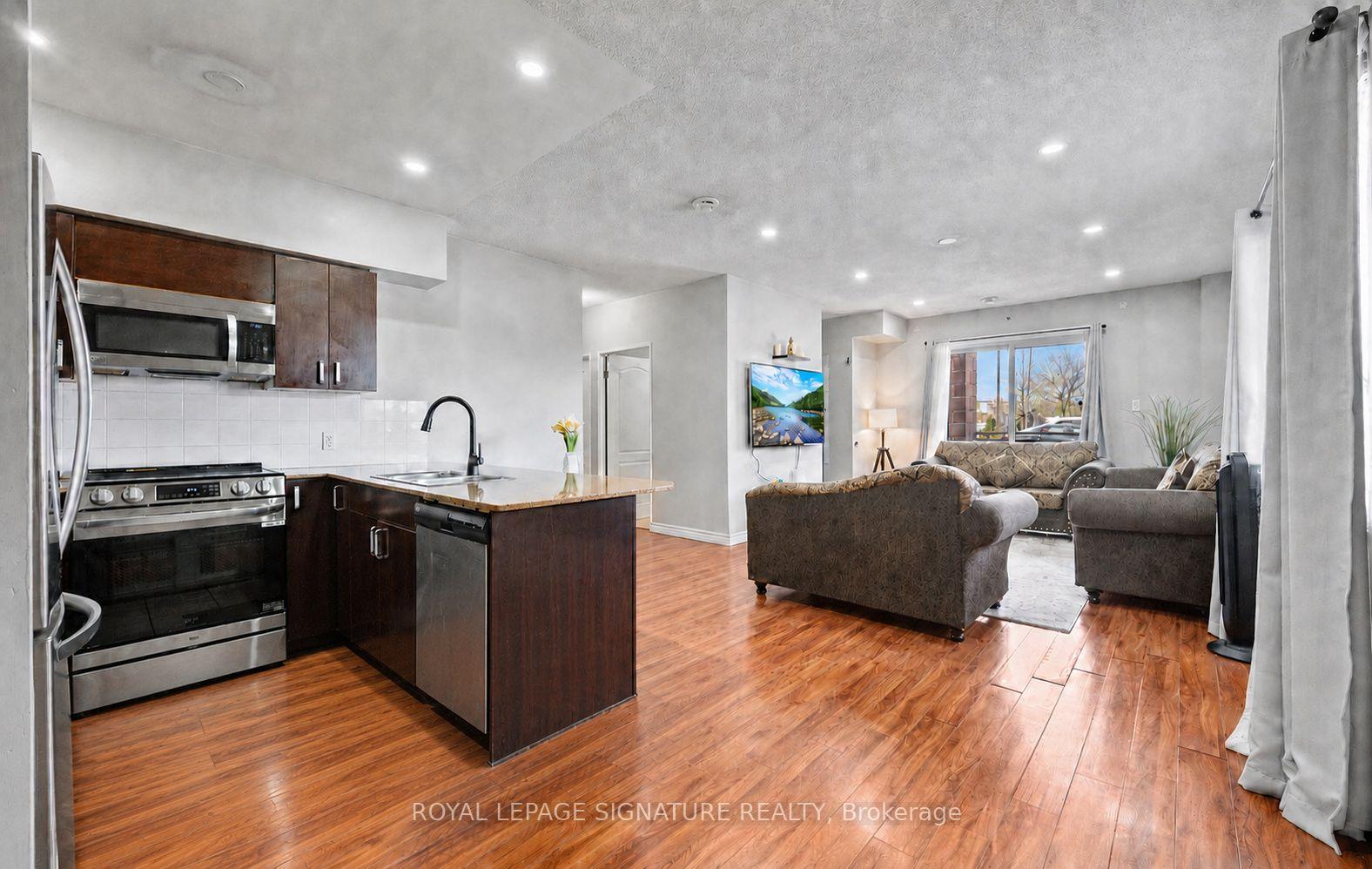 Photo 11 of Unit 104, 7405 Goreway Drive, Mississauga, Malton — HOMEH