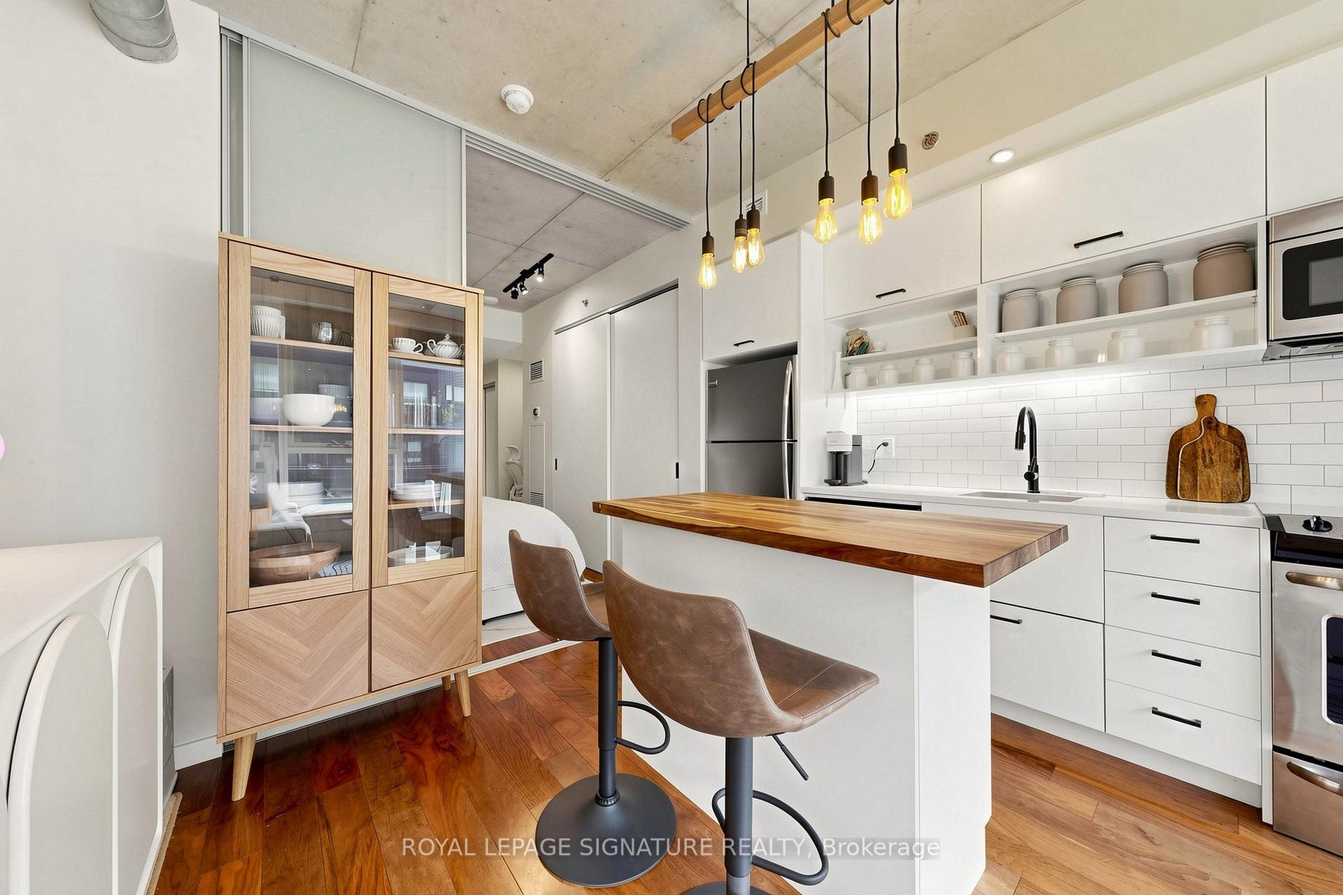 Photo 1 of Unit 414, 32 Trolley Crescent, Toronto, Moss Park — HOMEH