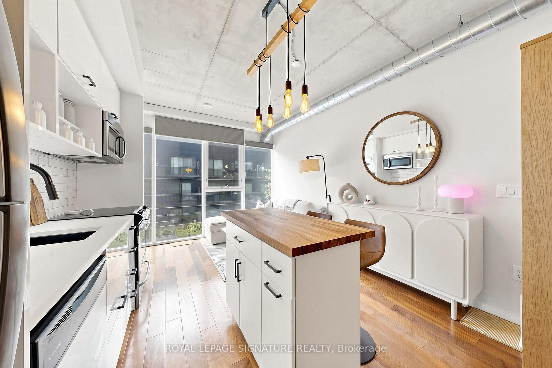 Photo 10 of Unit 414, 32 Trolley Crescent, Toronto, Moss Park — HOMEH