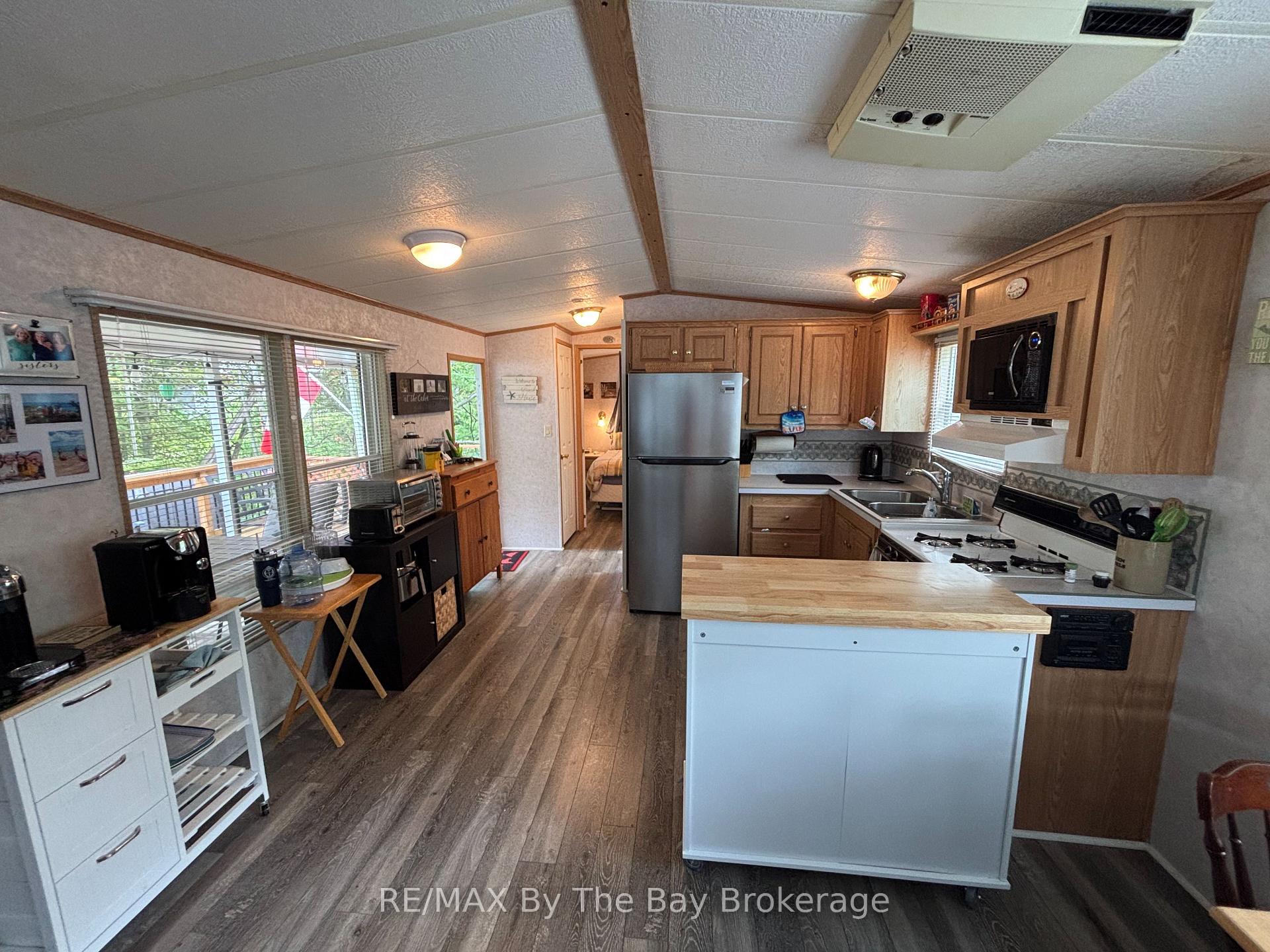 Photo 11 of Unit 168, 85 Theme Park Drive, Wasaga Beach — HOMEH