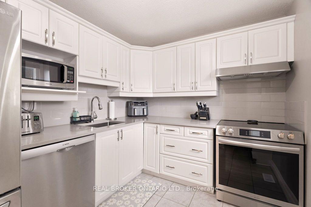 Photo 5 of 1699E Lamoureux Drive, Ottawa, Queenswood Heights South — HOMEH