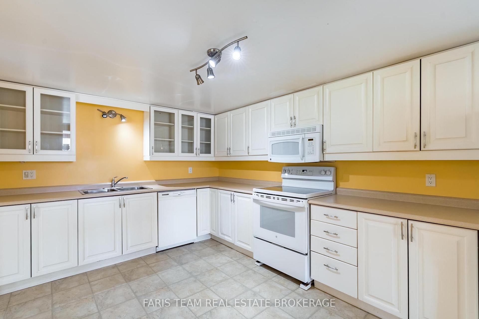 Photo 6 of Unit 202, 95 Matchedash Street N, Orillia — HOMEH