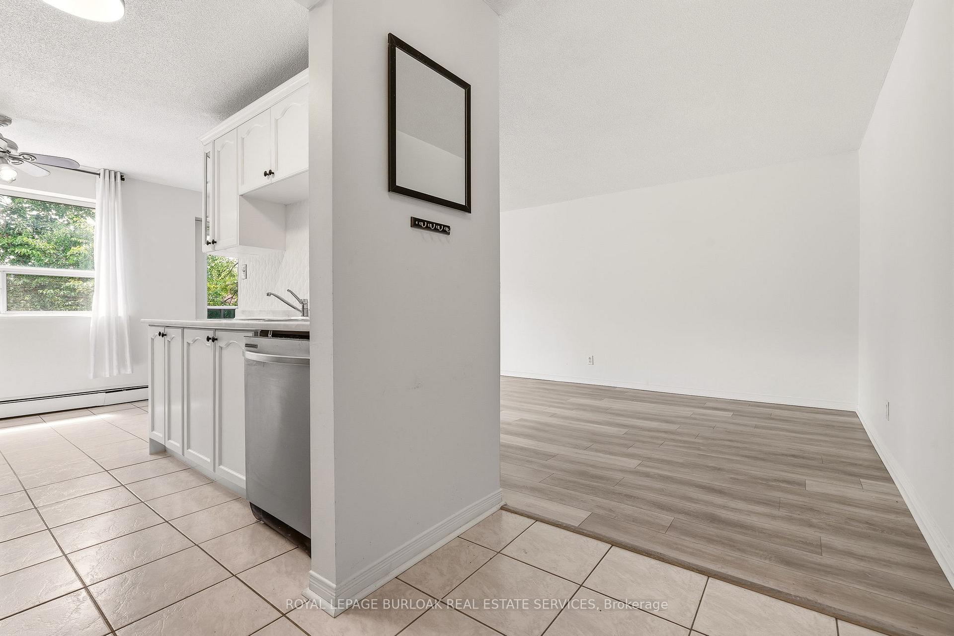 Photo 5 of Unit 201, 2411 New Street, Burlington, Brant — HOMEH