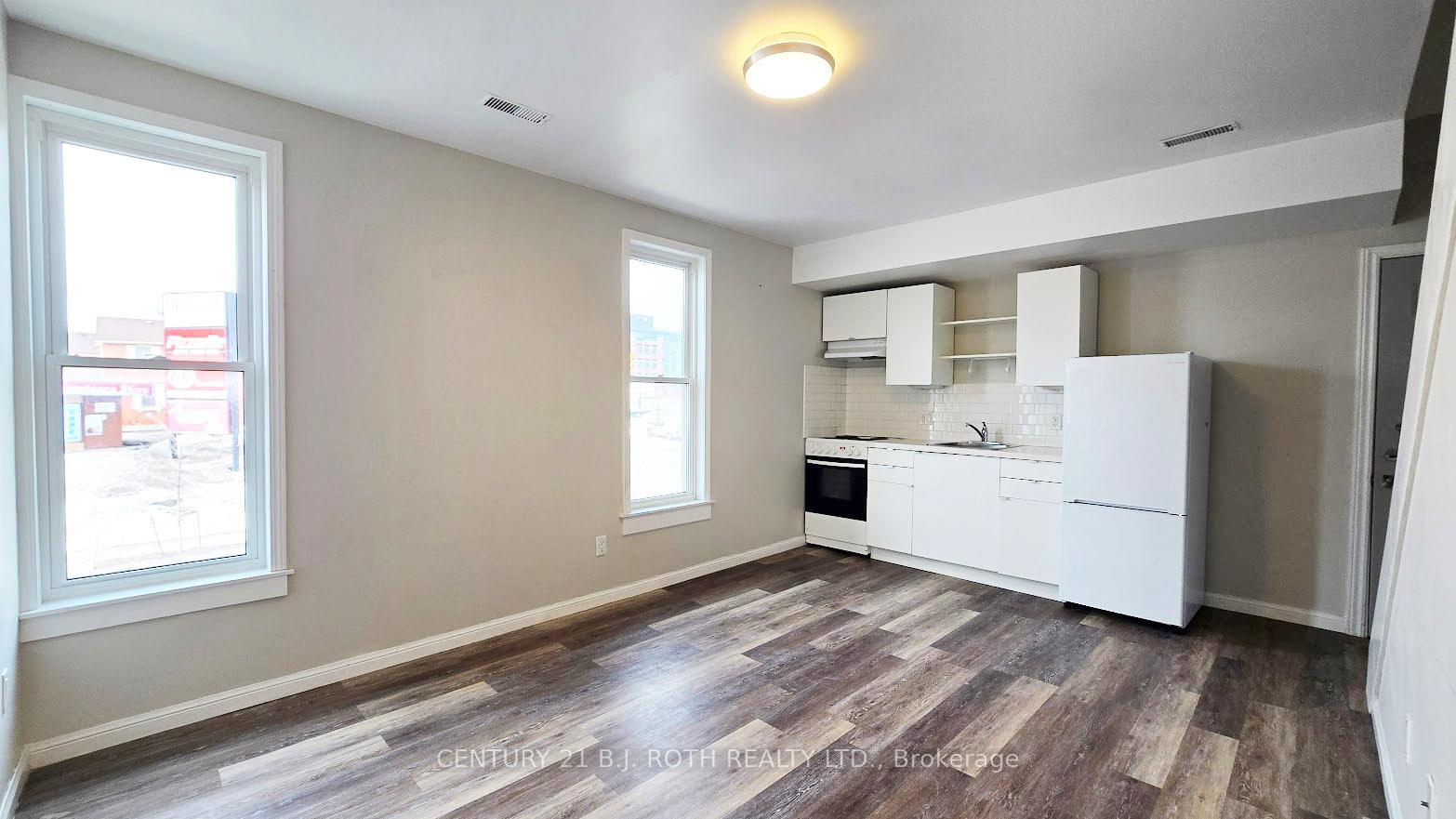 Photo 1 of Unit 4, 44 Front Street S, Orillia — HOMEH