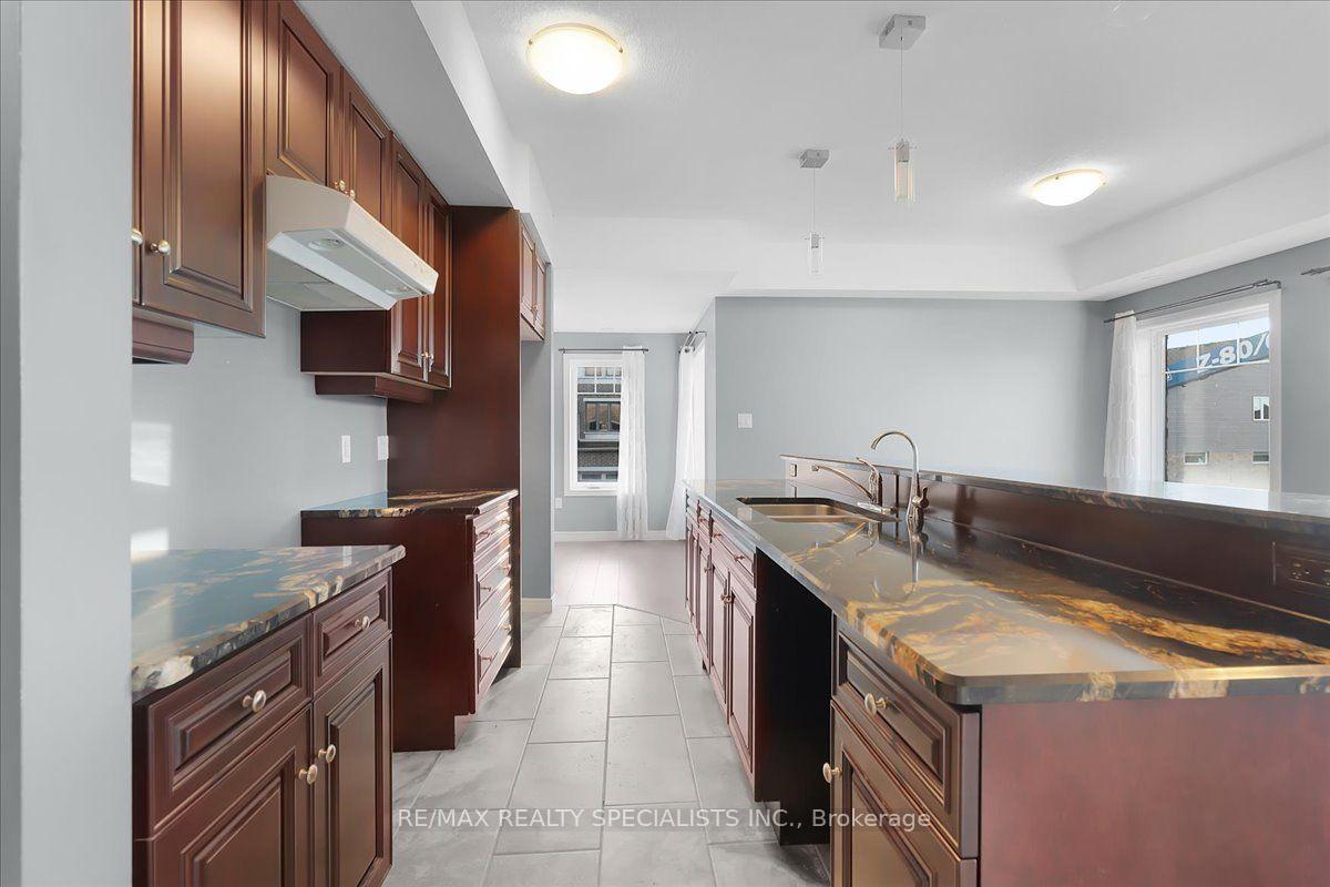Photo 10 of Unit E8, 70 Willowrun Drive, Kitchener, Idlewood/Lackner Woods — HOMEH