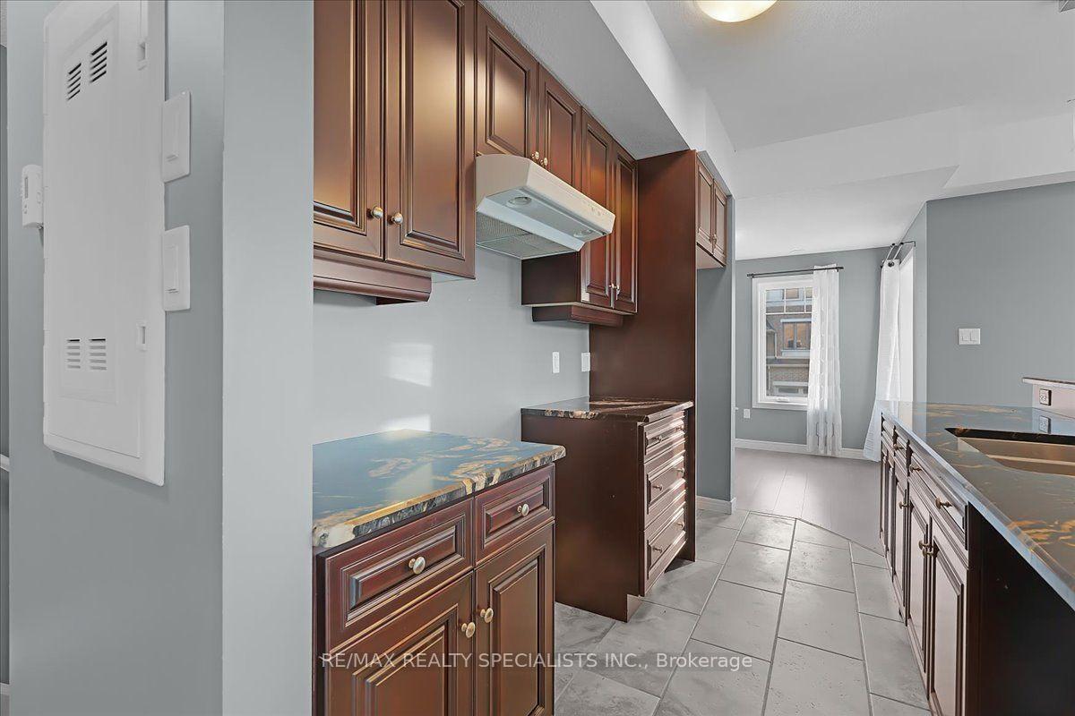 Photo 11 of Unit E8, 70 Willowrun Drive, Kitchener, Idlewood/Lackner Woods — HOMEH