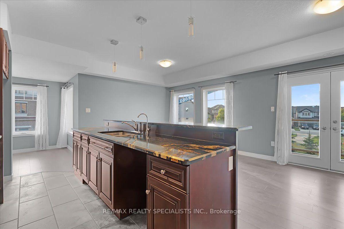 Photo 12 of Unit E8, 70 Willowrun Drive, Kitchener, Idlewood/Lackner Woods — HOMEH