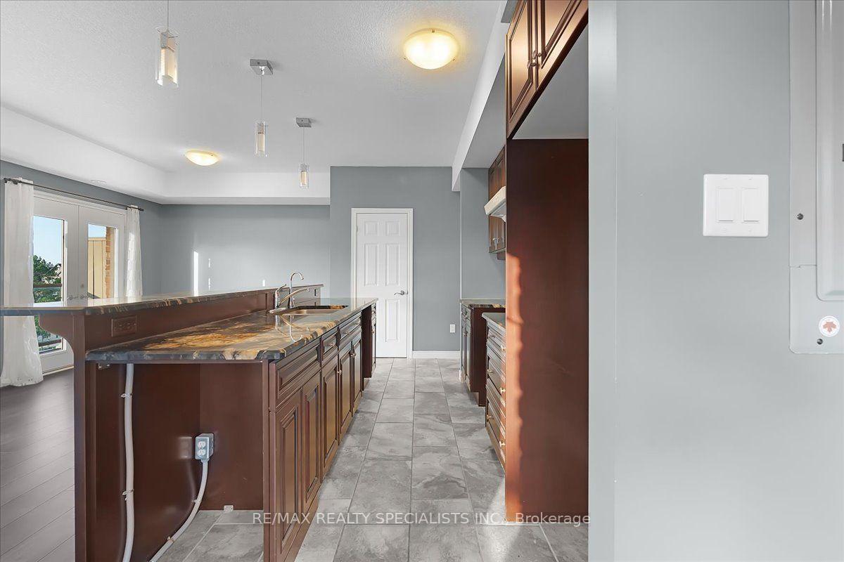 Photo 14 of Unit E8, 70 Willowrun Drive, Kitchener, Idlewood/Lackner Woods — HOMEH