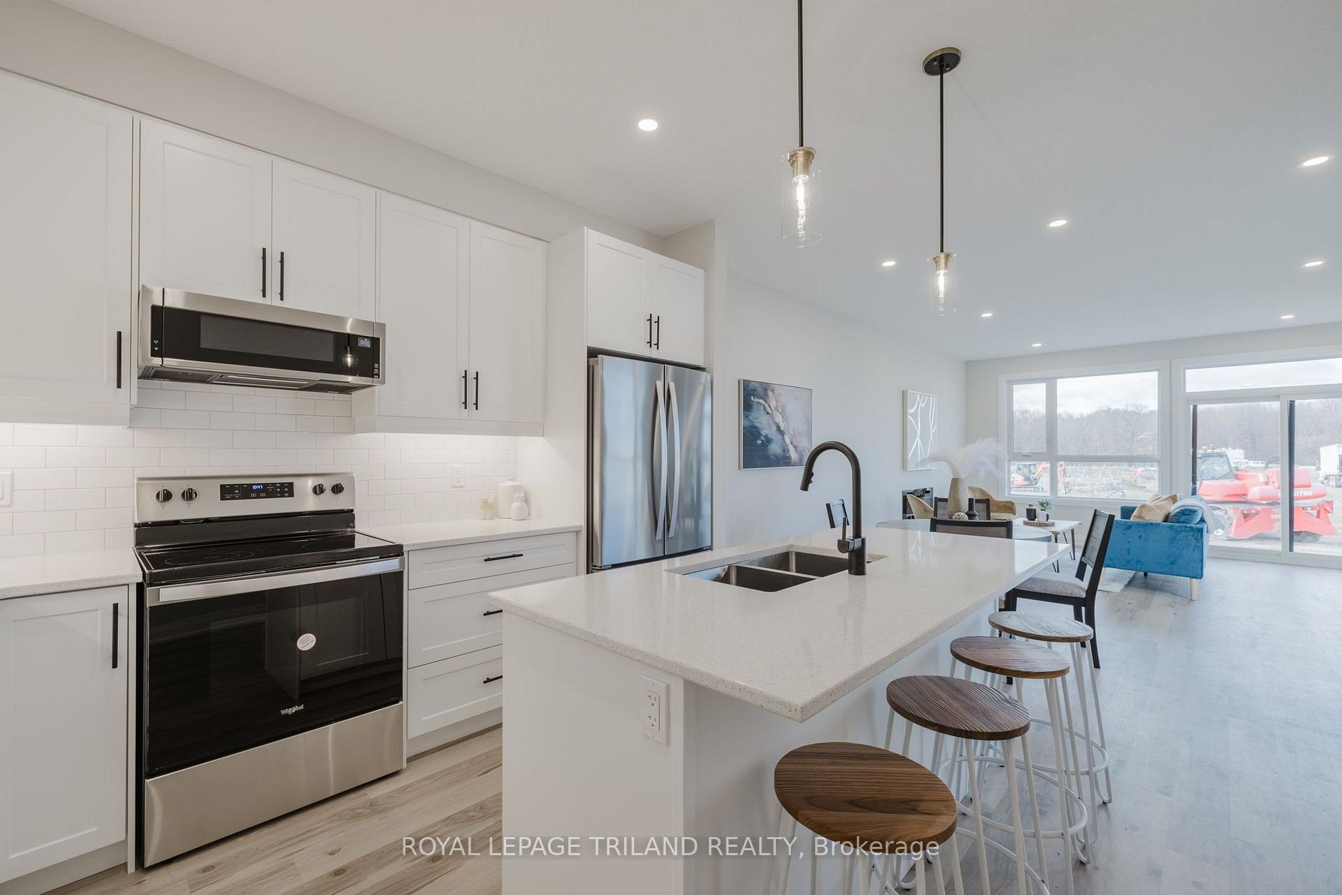 Photo 15 of 1899 Dalmagarry Road, London, North E — HOMEH