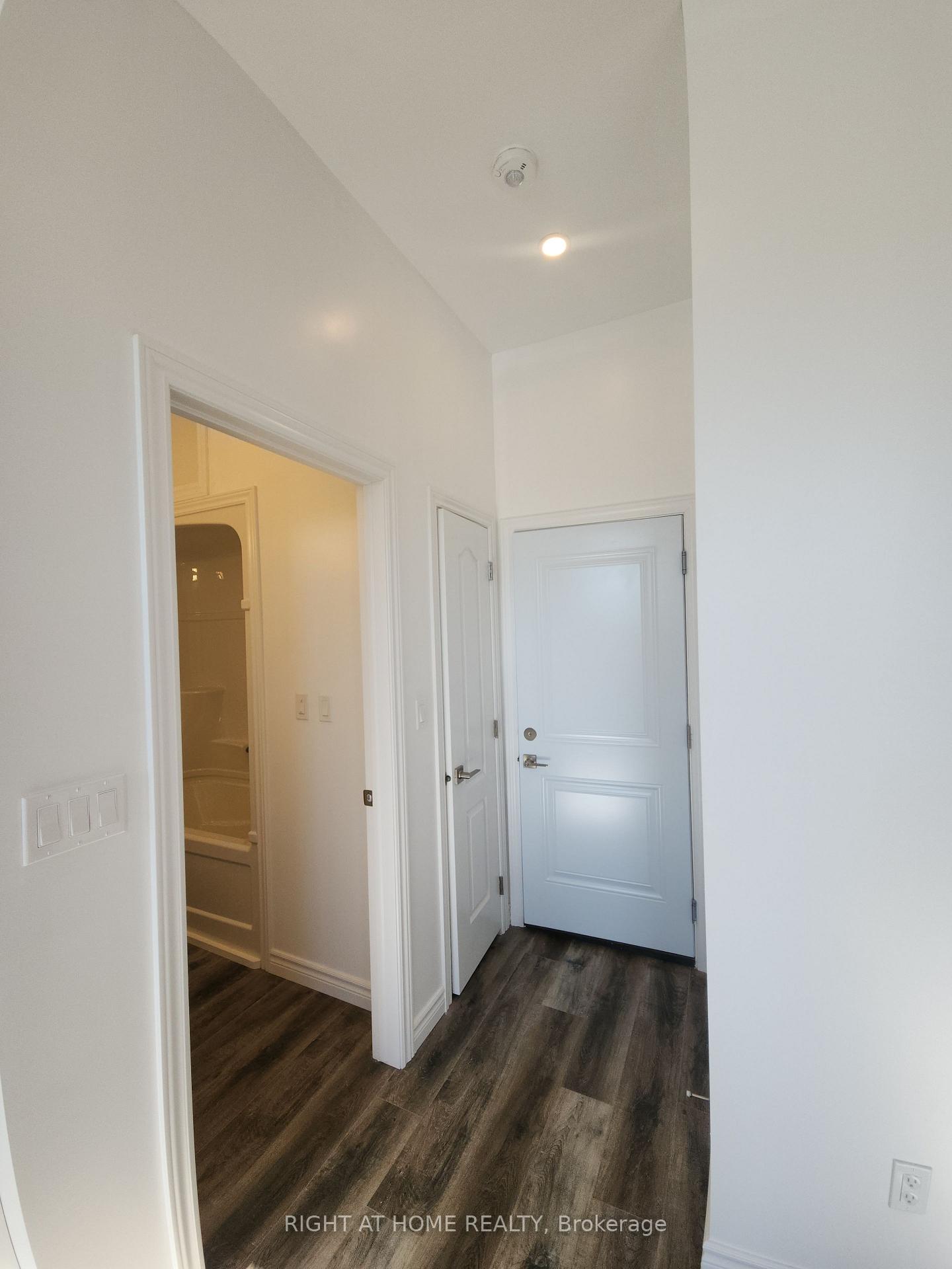 Photo 2 of Unit 201, 9 Queen Street W, Springwater, Elmvale — HOMEH