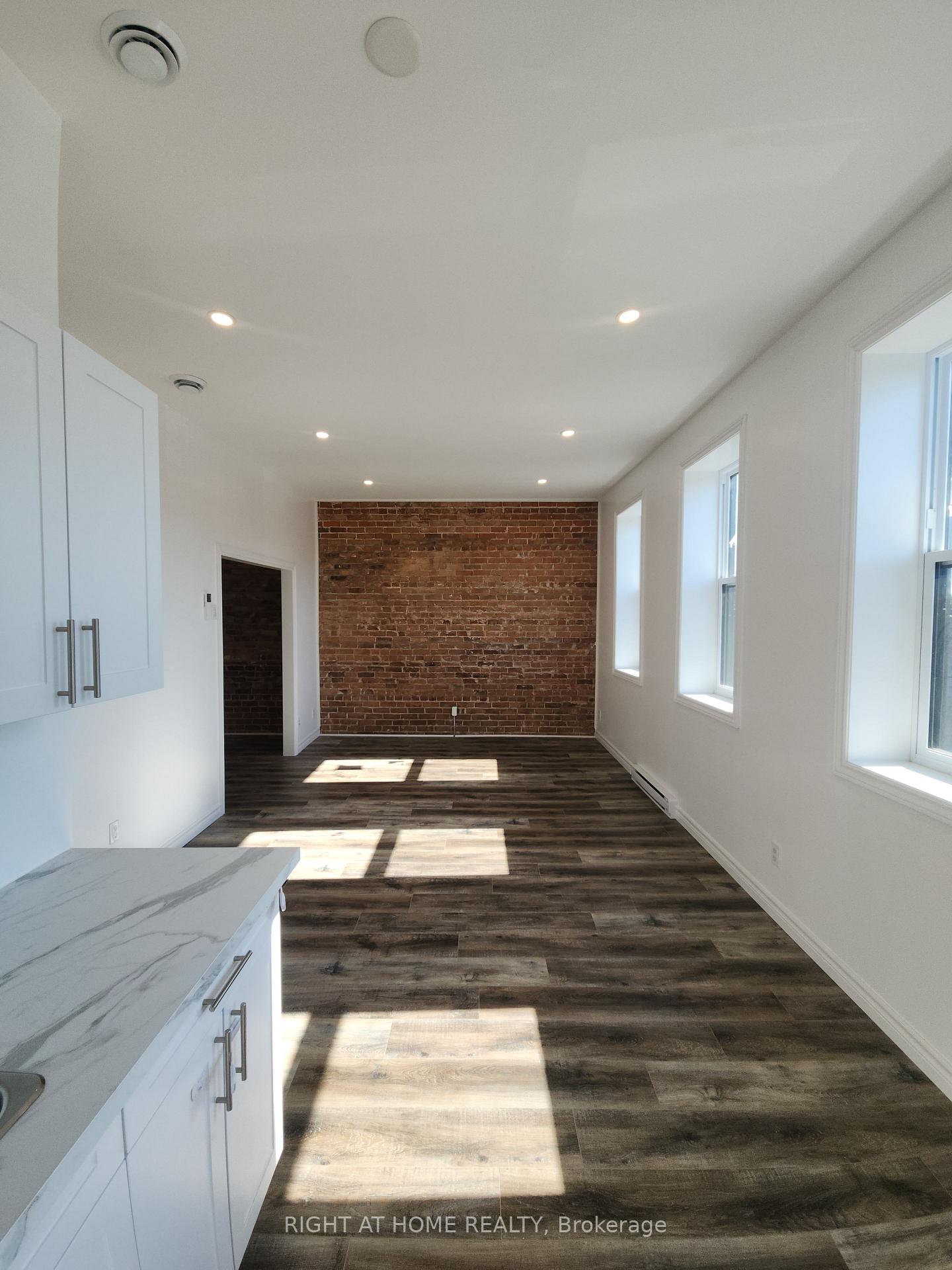 Photo 4 of Unit 201, 9 Queen Street W, Springwater, Elmvale — HOMEH