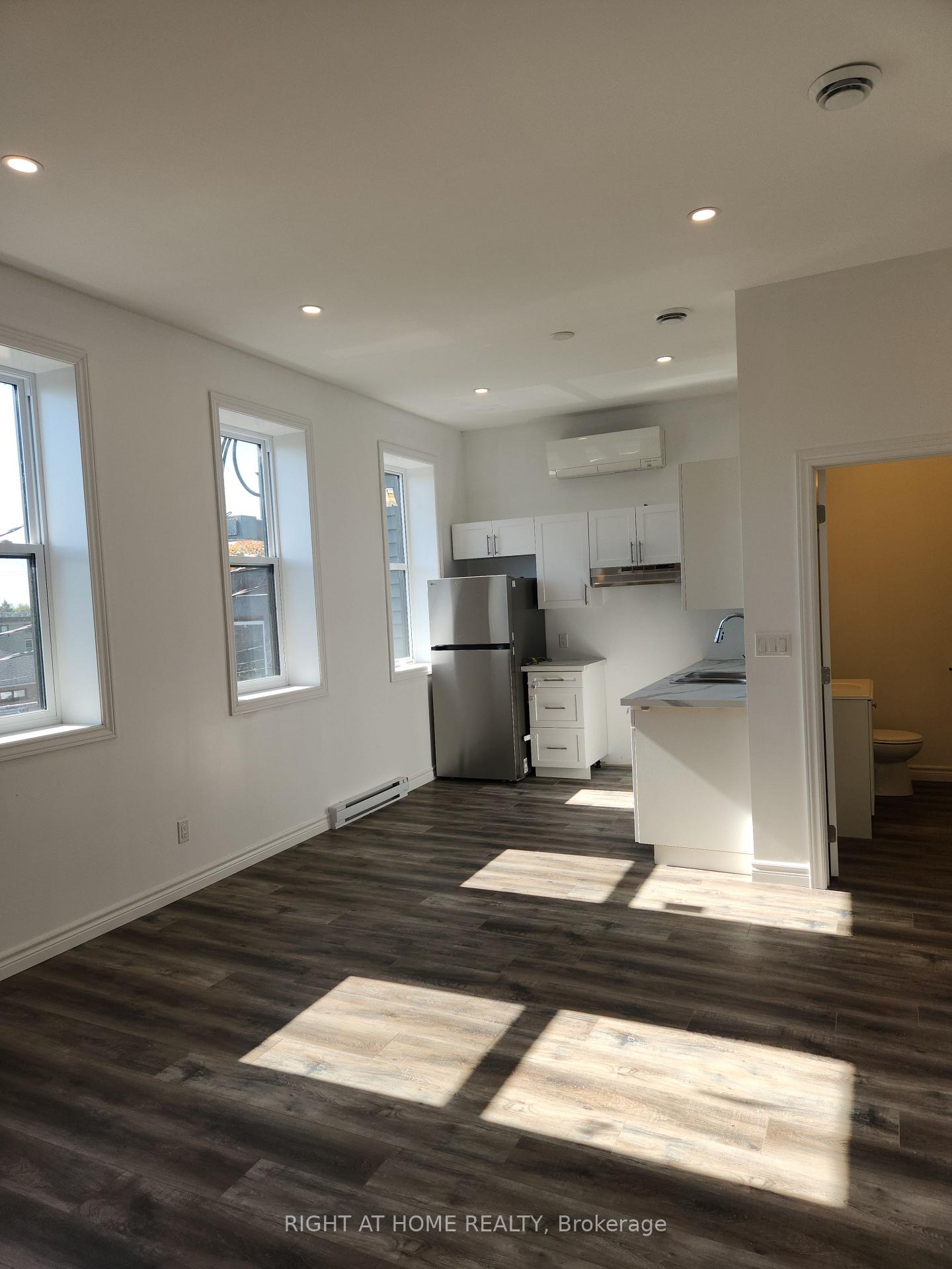 Photo 6 of Unit 201, 9 Queen Street W, Springwater, Elmvale — HOMEH