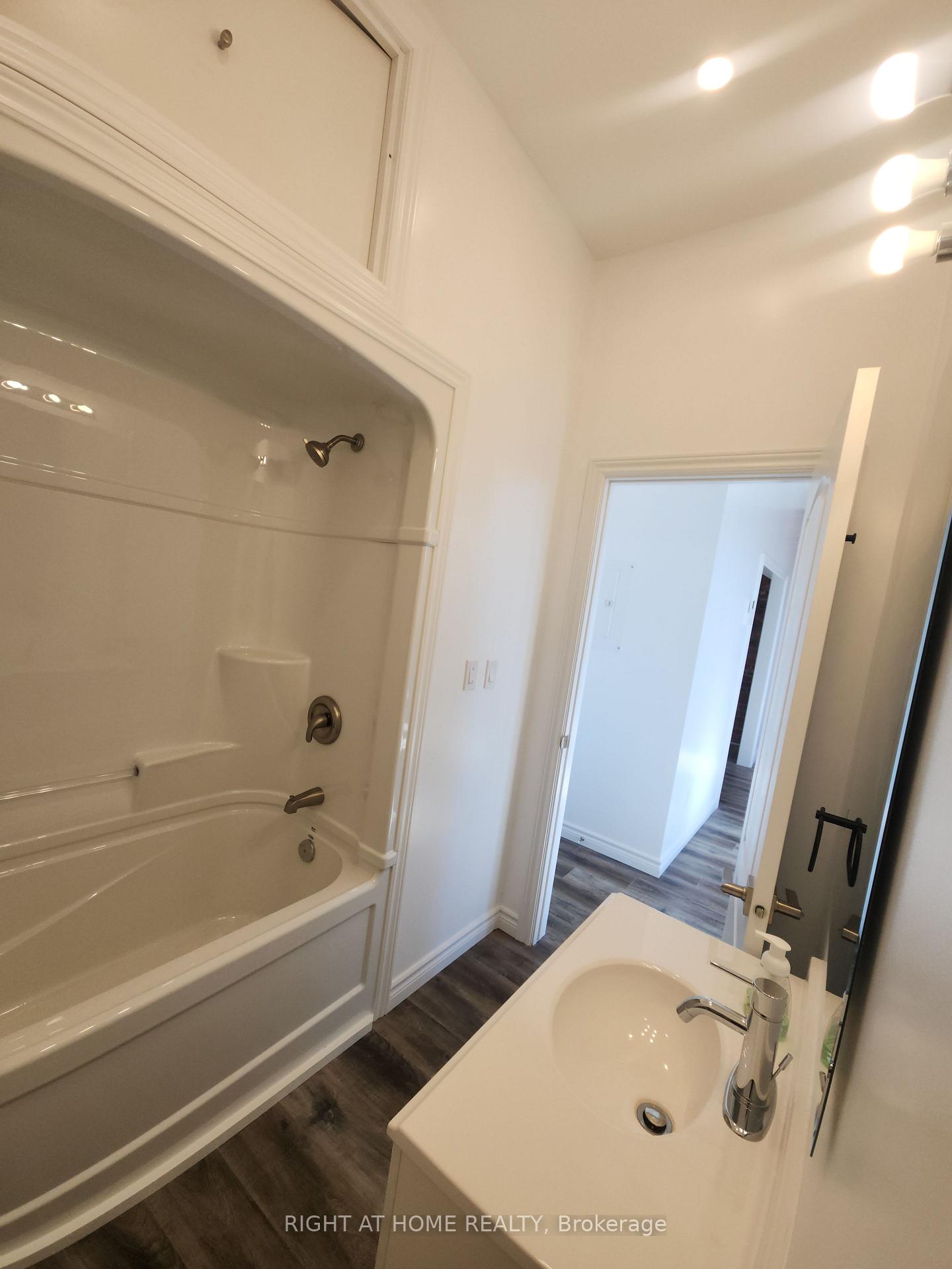Photo 10 of Unit 201, 9 Queen Street W, Springwater, Elmvale — HOMEH