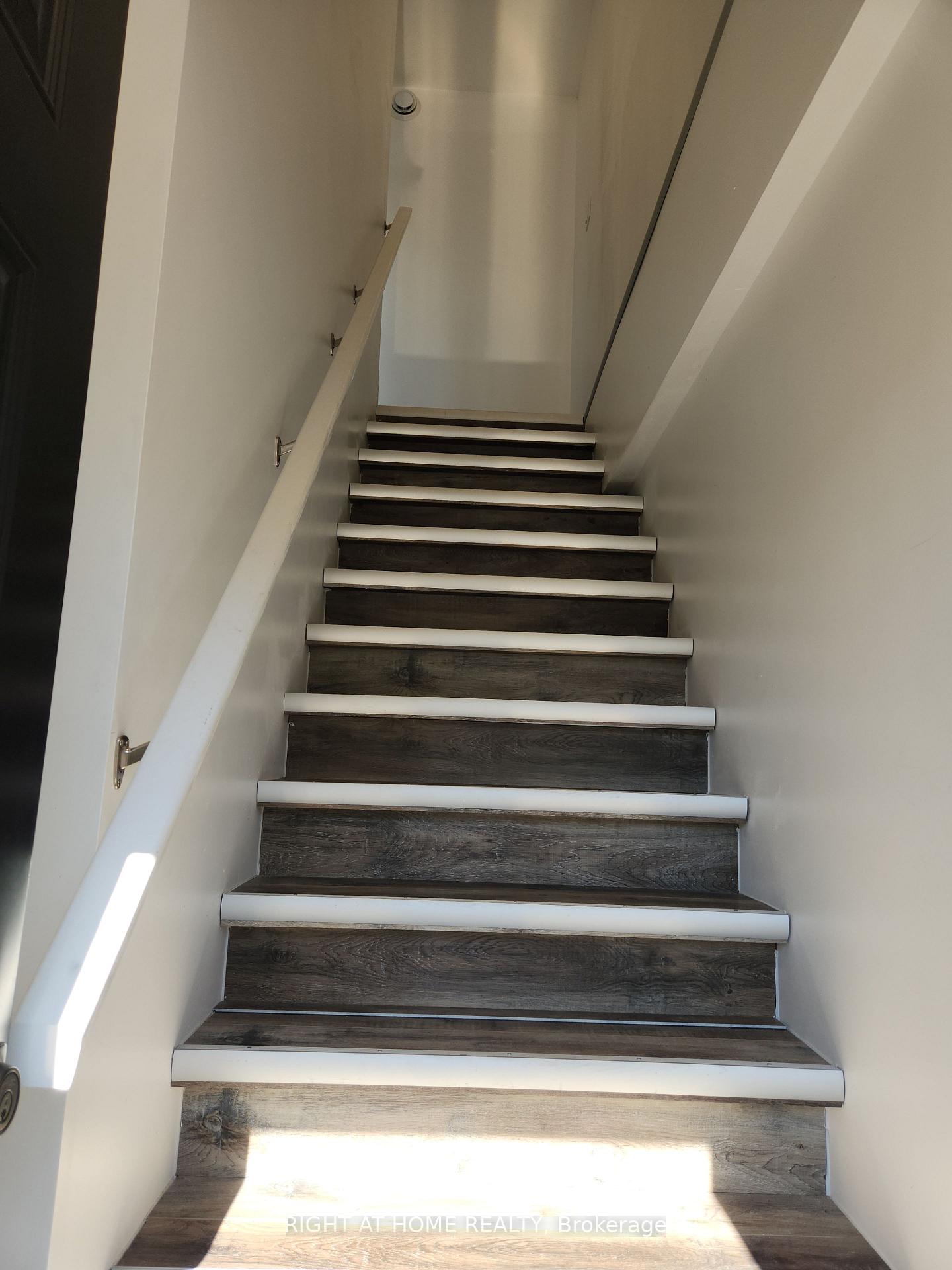 Photo 12 of Unit 201, 9 Queen Street W, Springwater, Elmvale — HOMEH