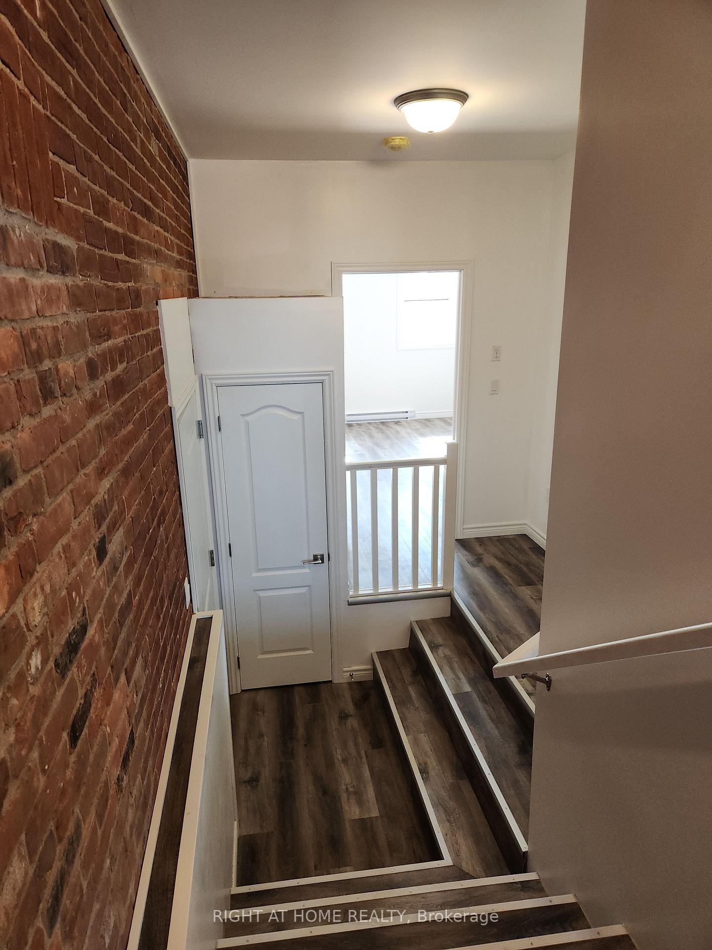 Photo 2 of Unit 203, 9 Queen Street W, Springwater, Elmvale — HOMEH