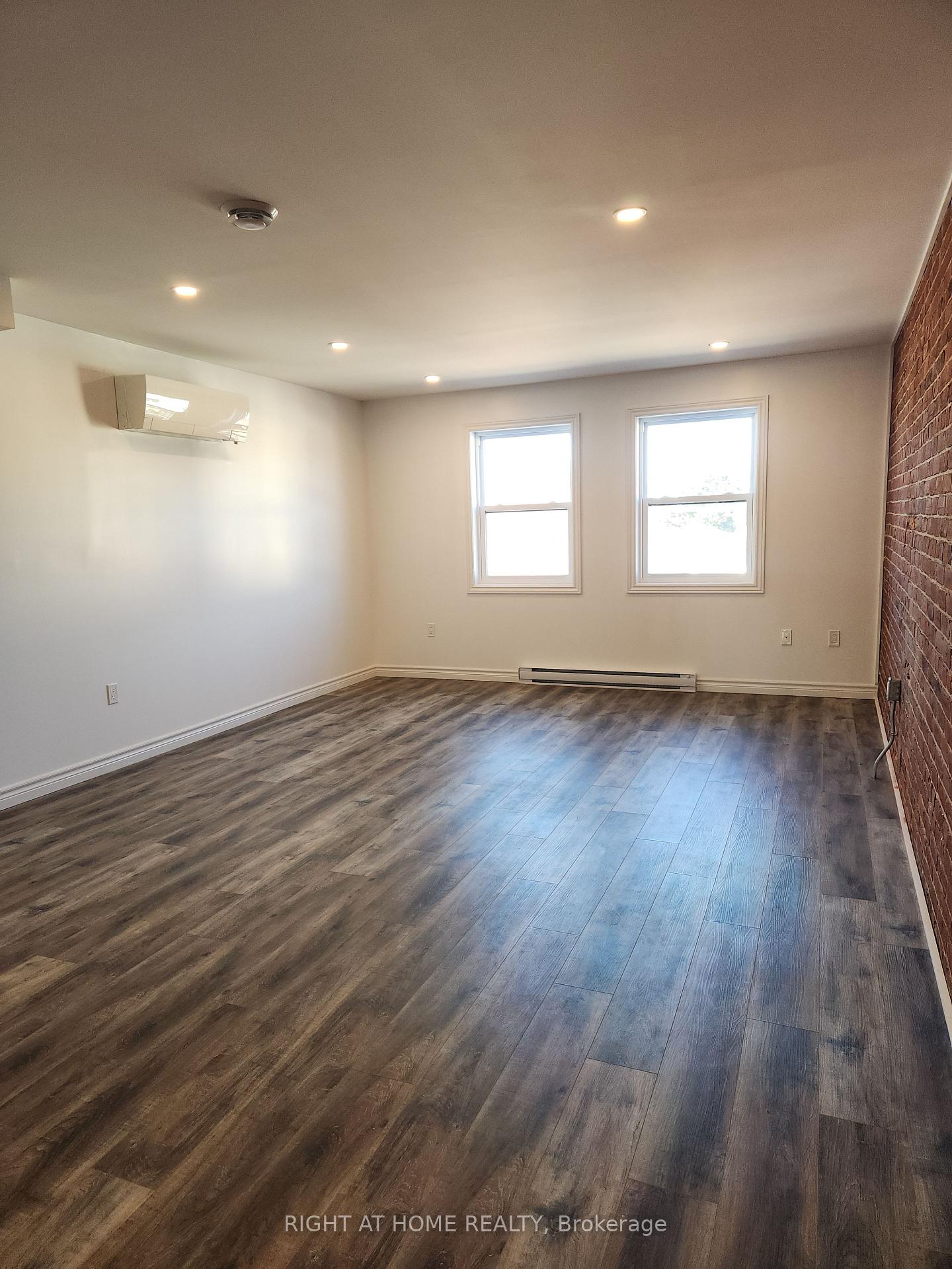 Photo 3 of Unit 203, 9 Queen Street W, Springwater, Elmvale — HOMEH