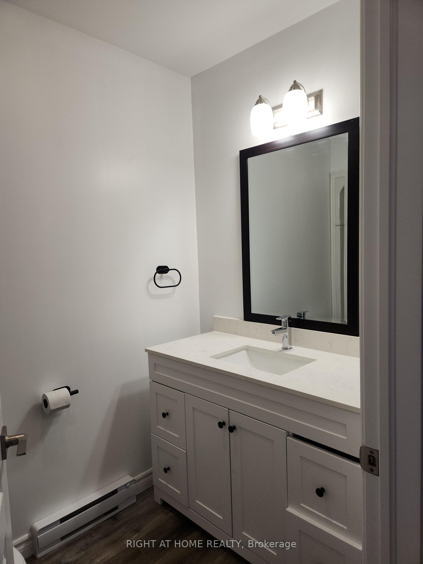 Photo 6 of Unit 203, 9 Queen Street W, Springwater, Elmvale — HOMEH