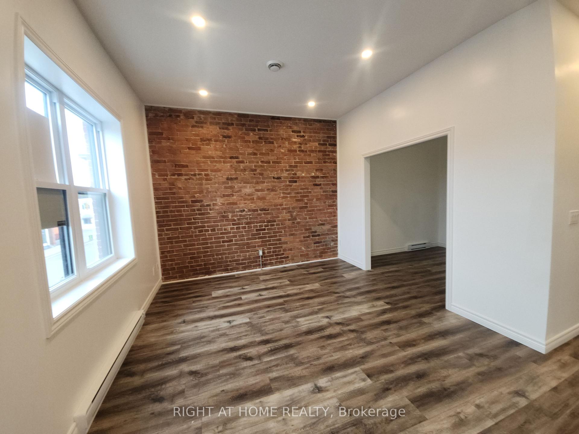 Photo 2 of Unit 202, 9 Queen Street W, Springwater, Elmvale — HOMEH